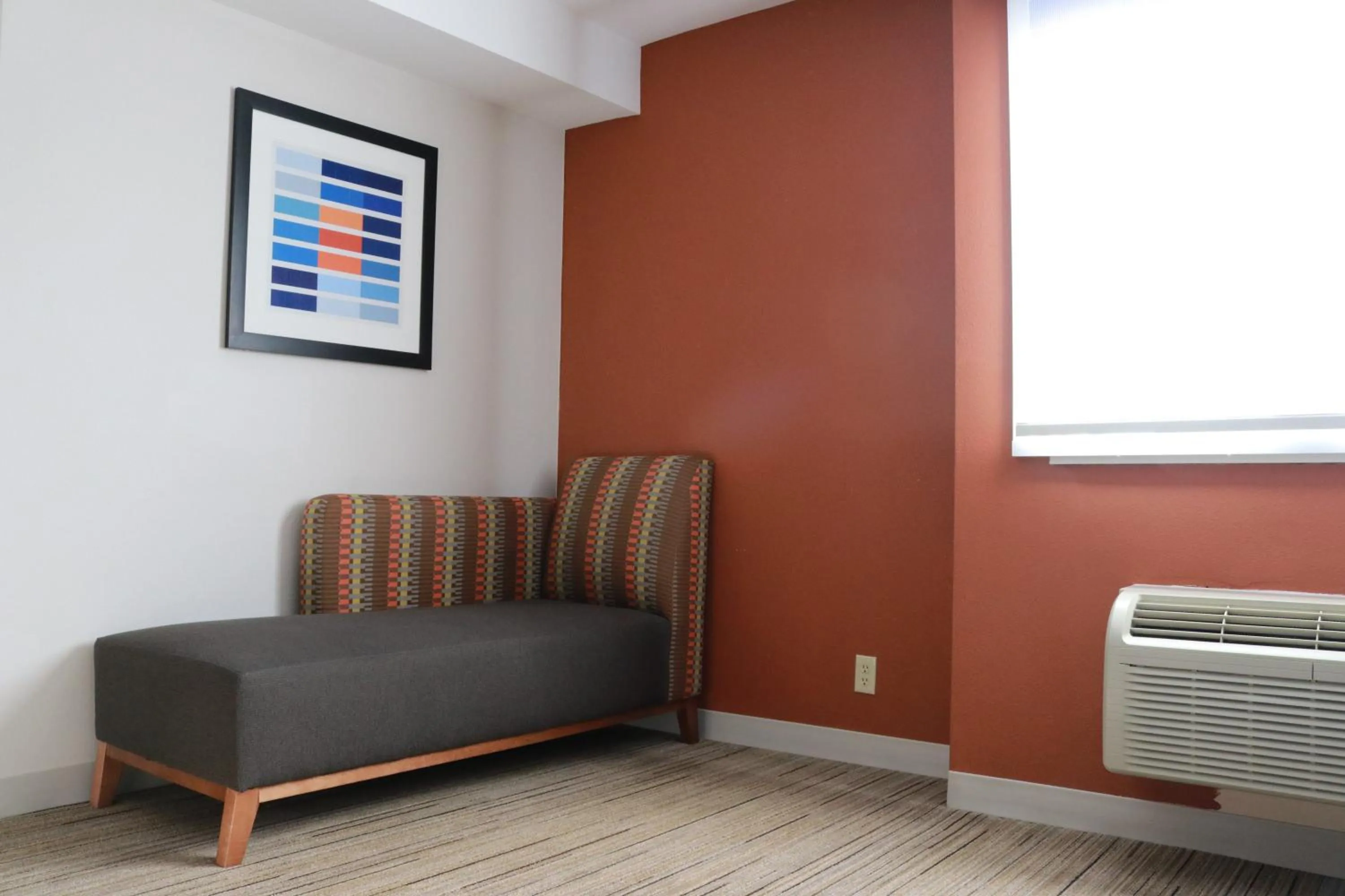 Living room in Holiday Inn Express Seattle - Sea-Tac Airport by IHG