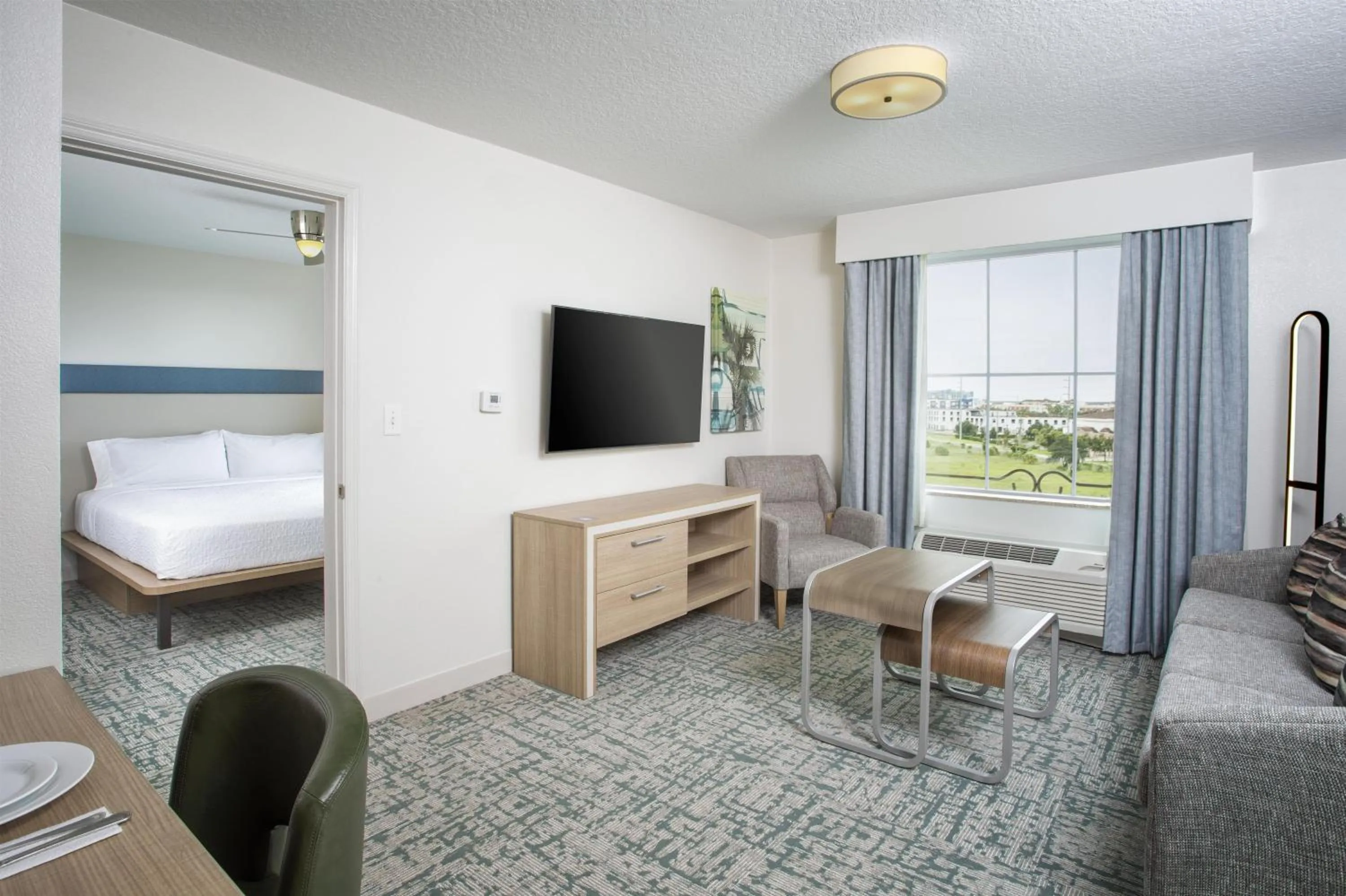 Living room, Bed in Homewood Suites by Hilton Lake Buena Vista Orlando - Newly Renovated!