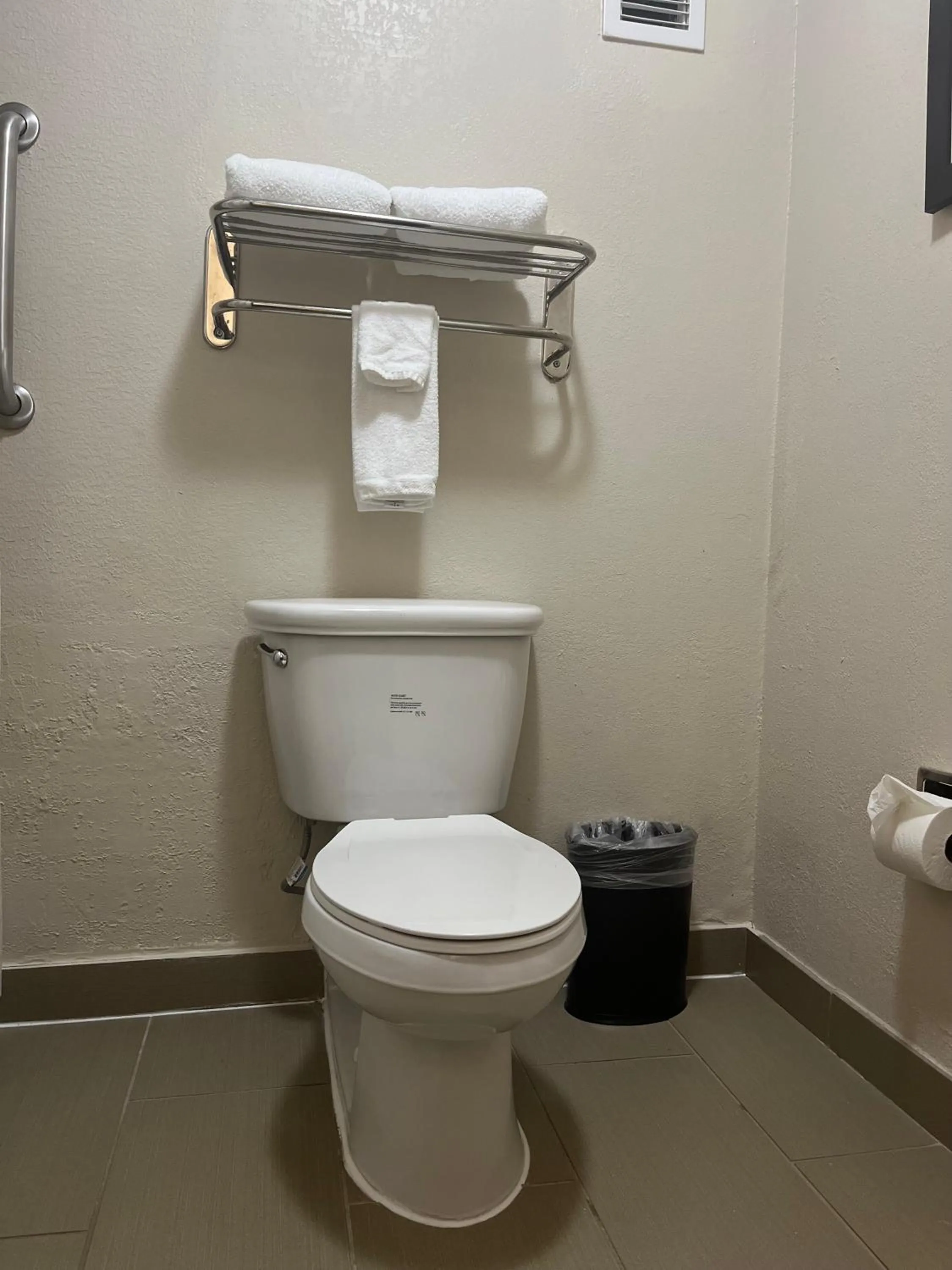 Toilet in Holiday Inn Houston SW-Near Sugar Land, an IHG Hotel