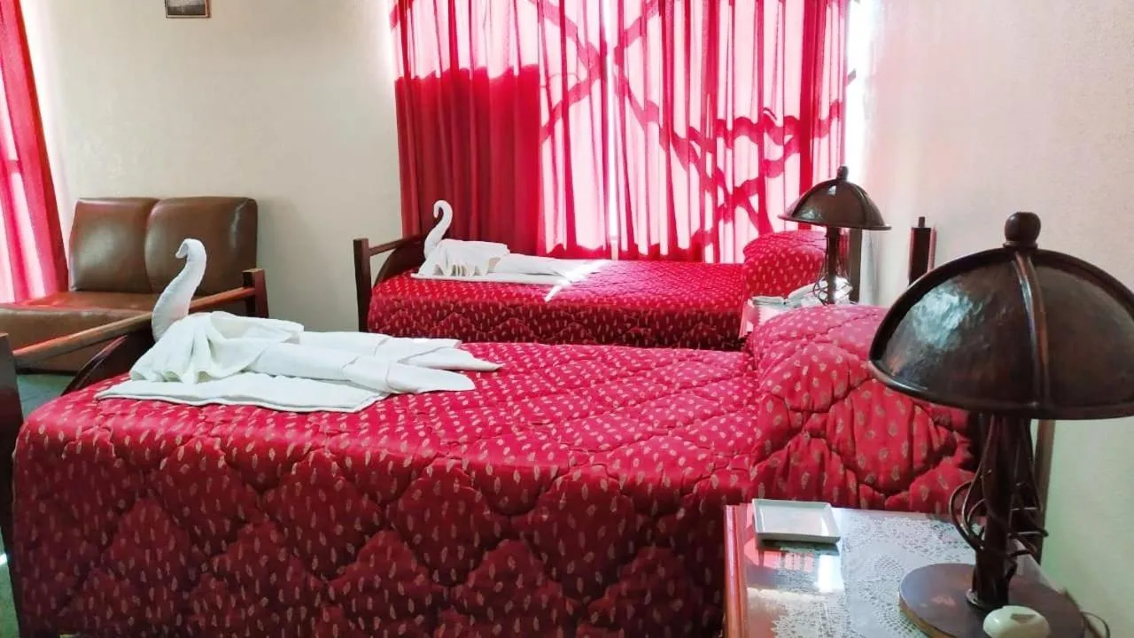 Bed in Hotel Alexander