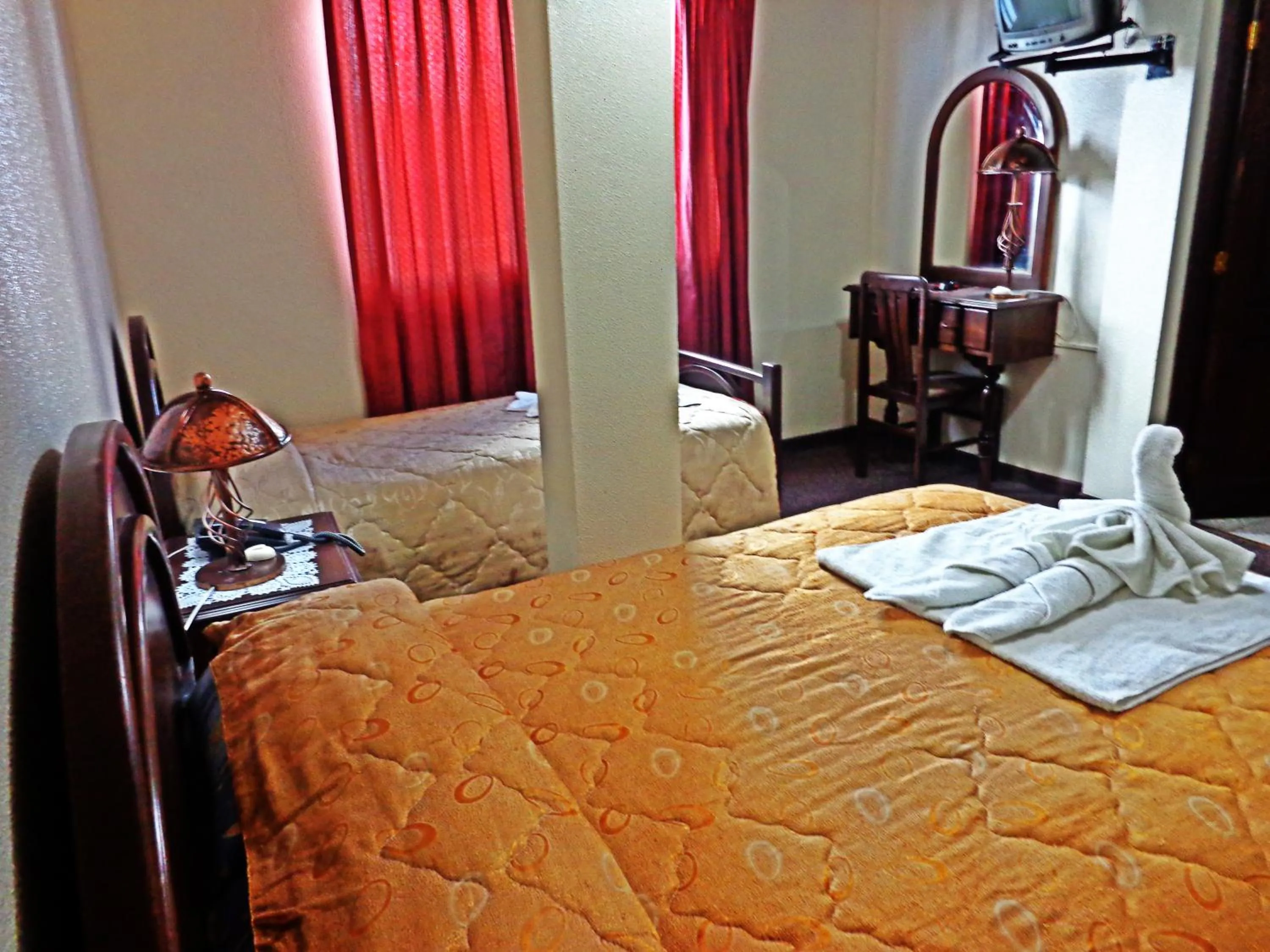 Bed in Hotel Alexander