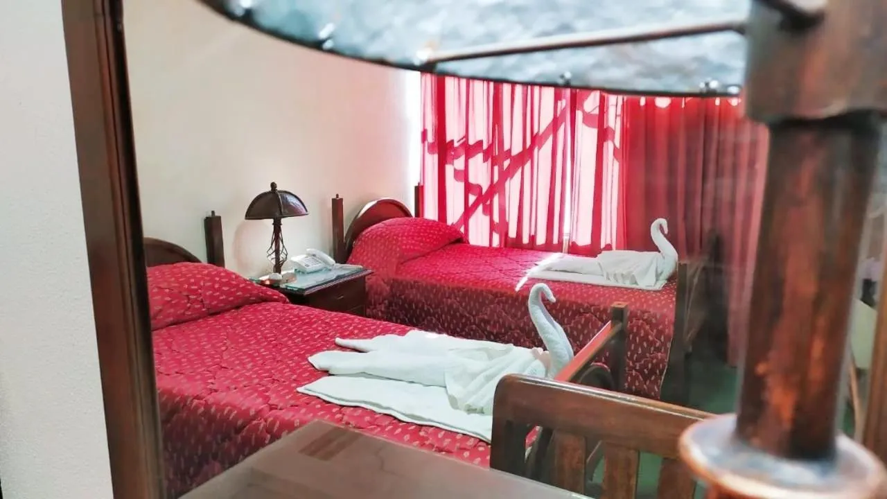 Bed in Hotel Alexander