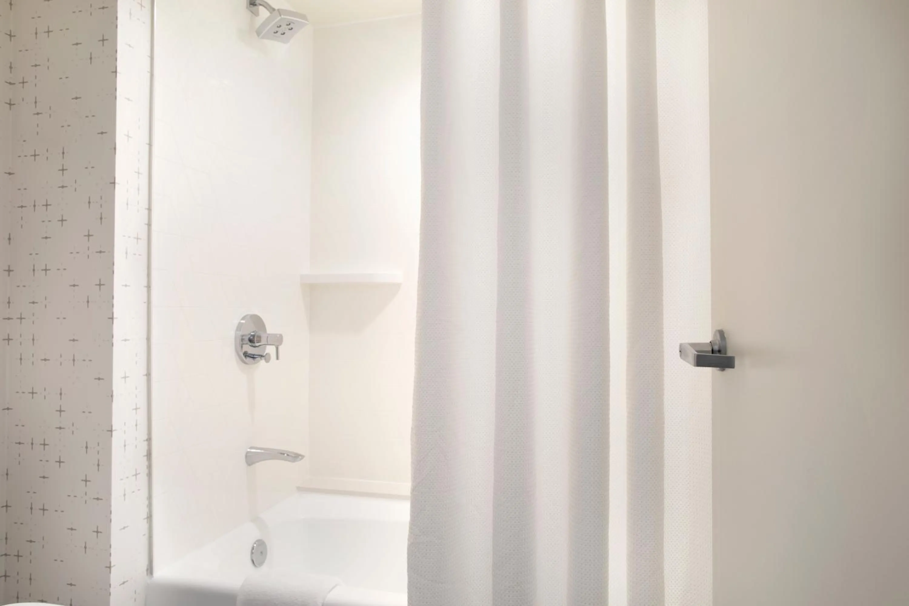 Bathroom in Crowne Plaza Atlanta Perimeter at Ravinia by IHG