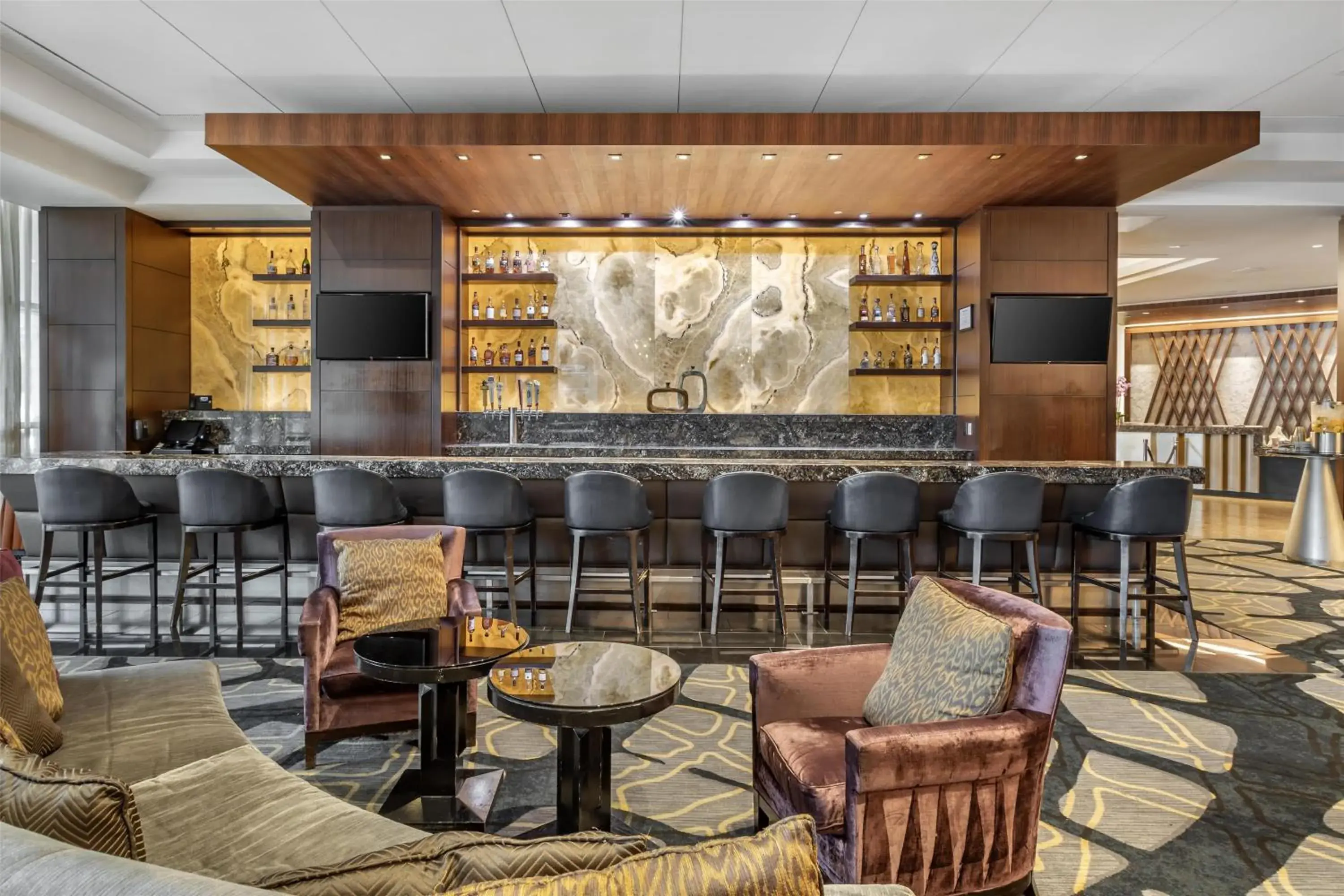 Lounge or bar in The Royal Sonesta Houston Galleria Lounge or bar in The Royal Sonesta Houston Galleria