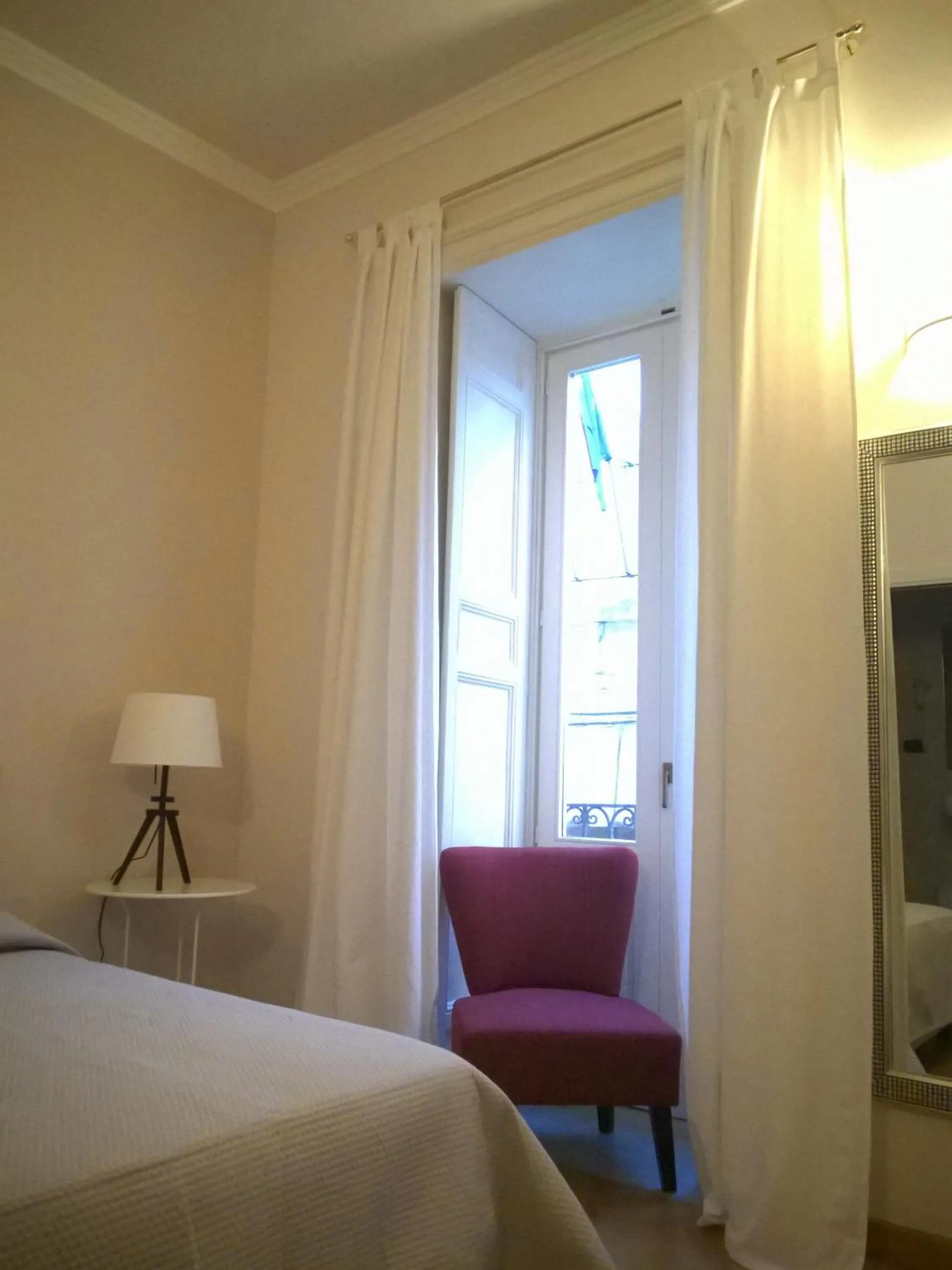 Seating area, Bed in B&B Casa D'alleri