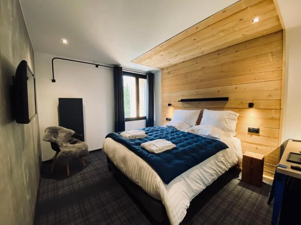 Bed in Hôtel 16 | 150 Montagne & Spa Nuxe