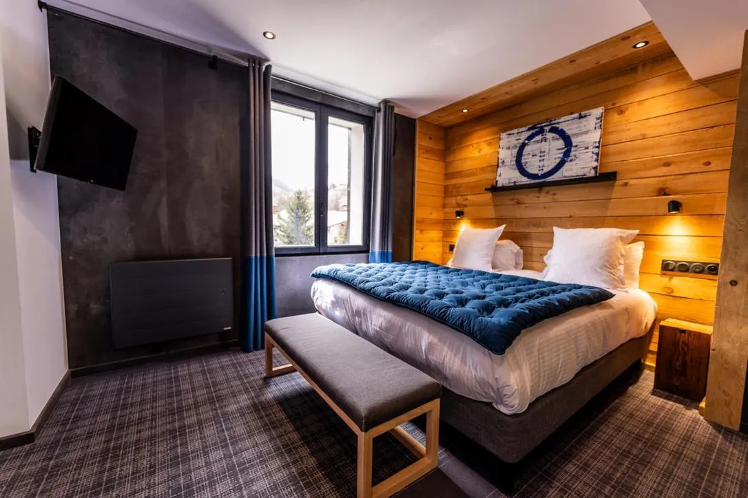 Bed in Hôtel 16 | 150 Montagne & Spa Nuxe