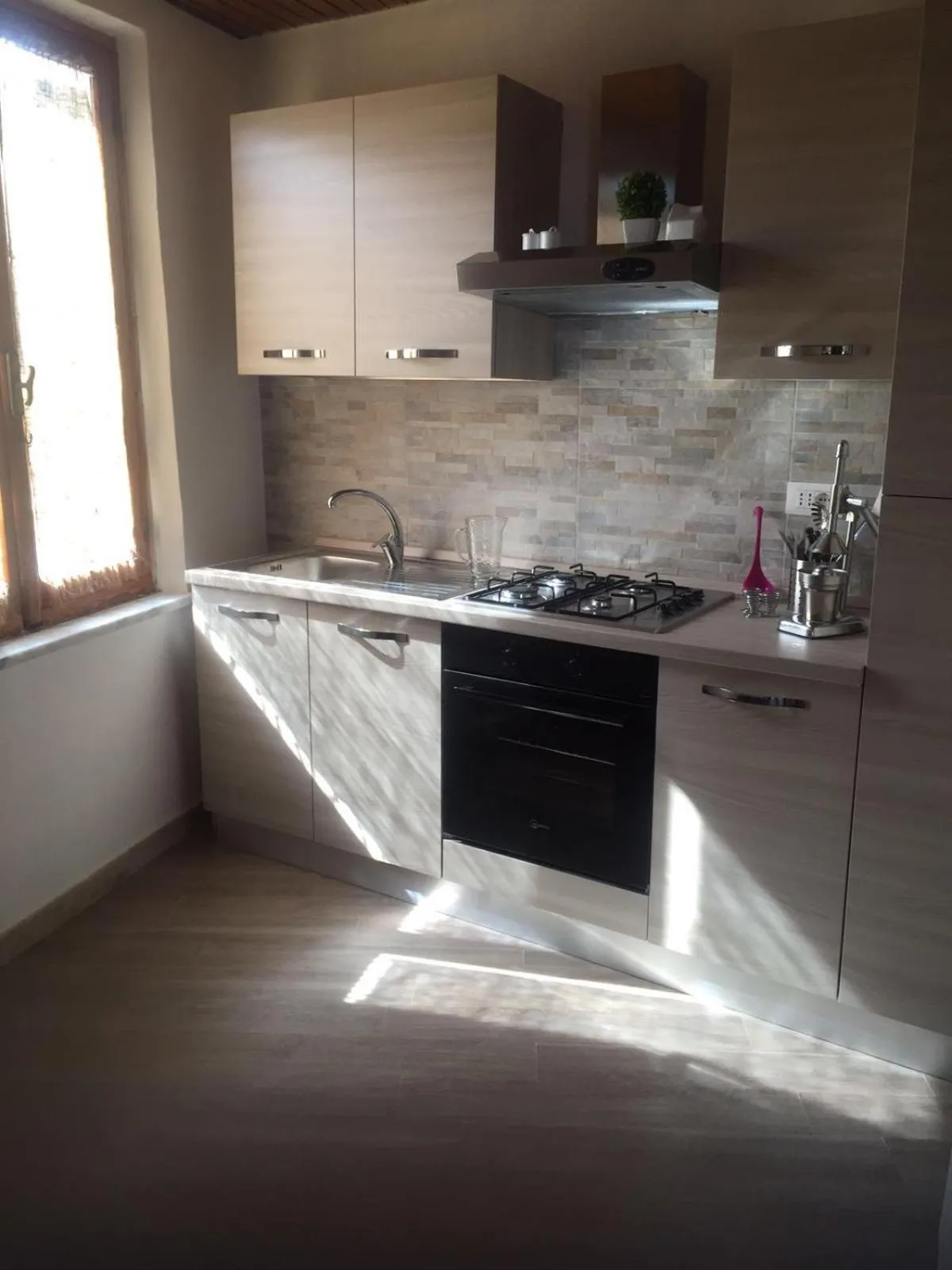 Communal kitchen in B.E.A. Maison