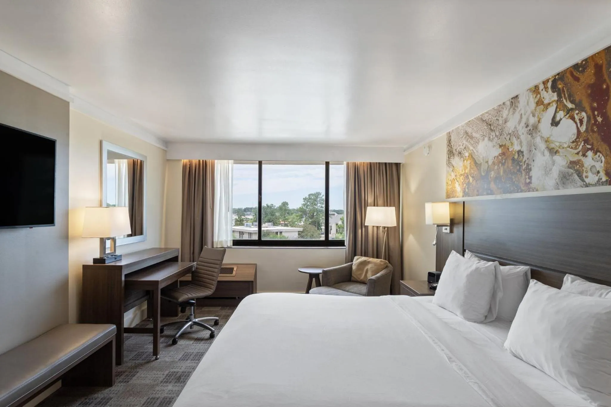 Photo of the whole room, Bed in Crowne Plaza Executive Center Baton Rouge by IHG