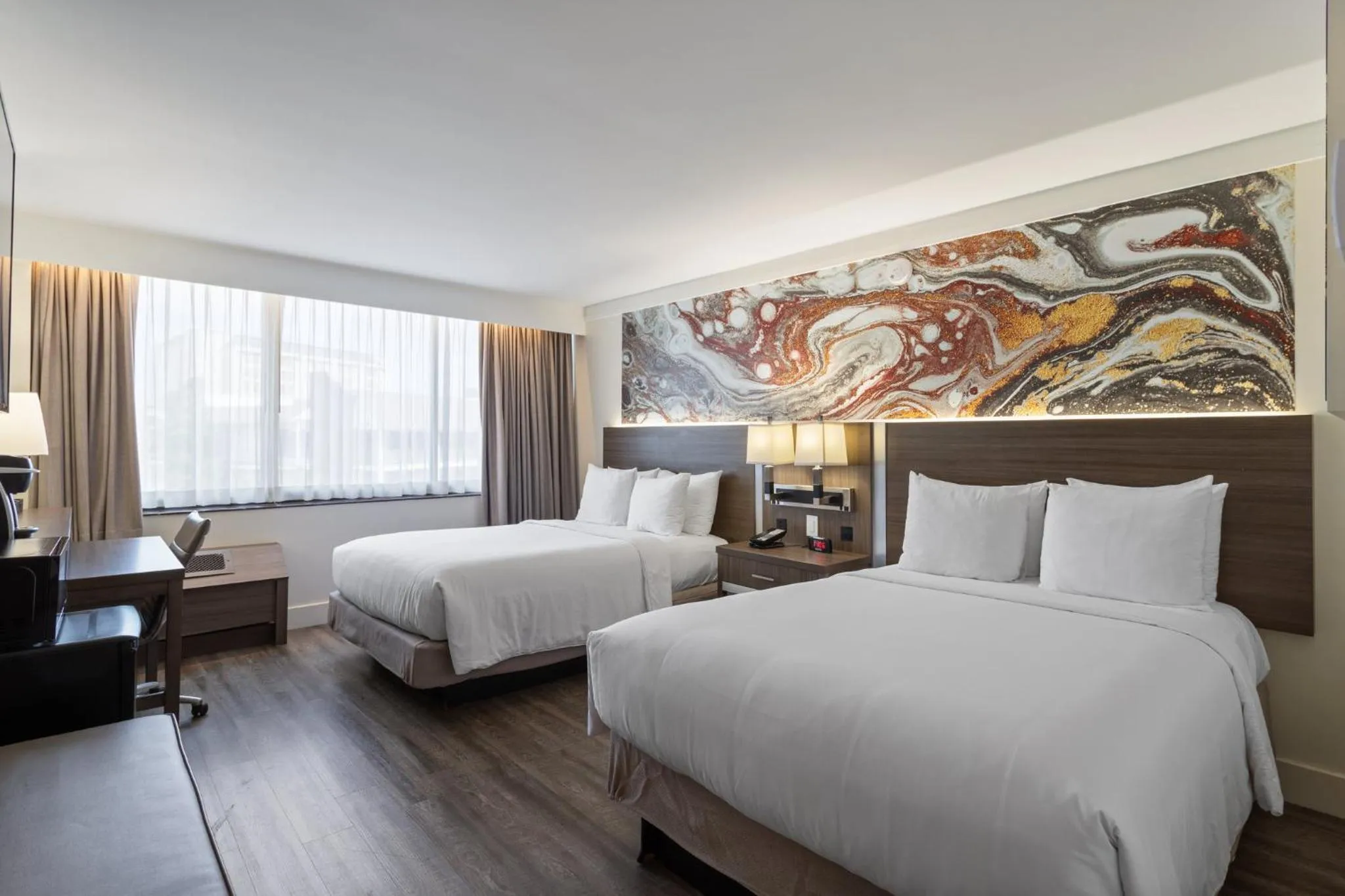 Photo of the whole room, Bed in Crowne Plaza Executive Center Baton Rouge by IHG