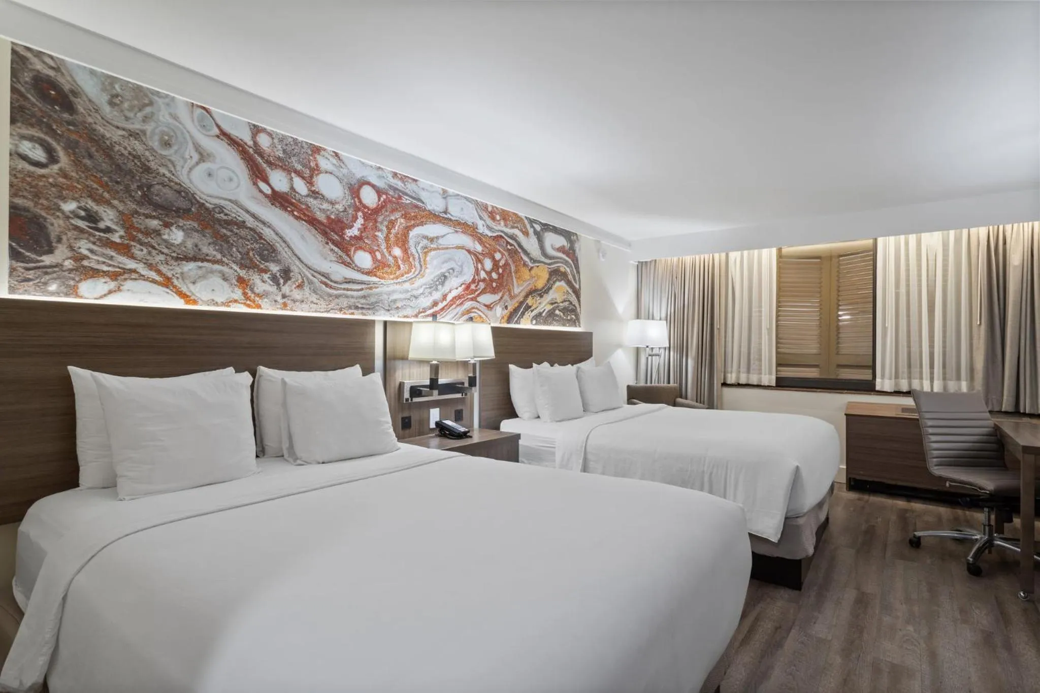 Photo of the whole room, Bed in Crowne Plaza Executive Center Baton Rouge by IHG