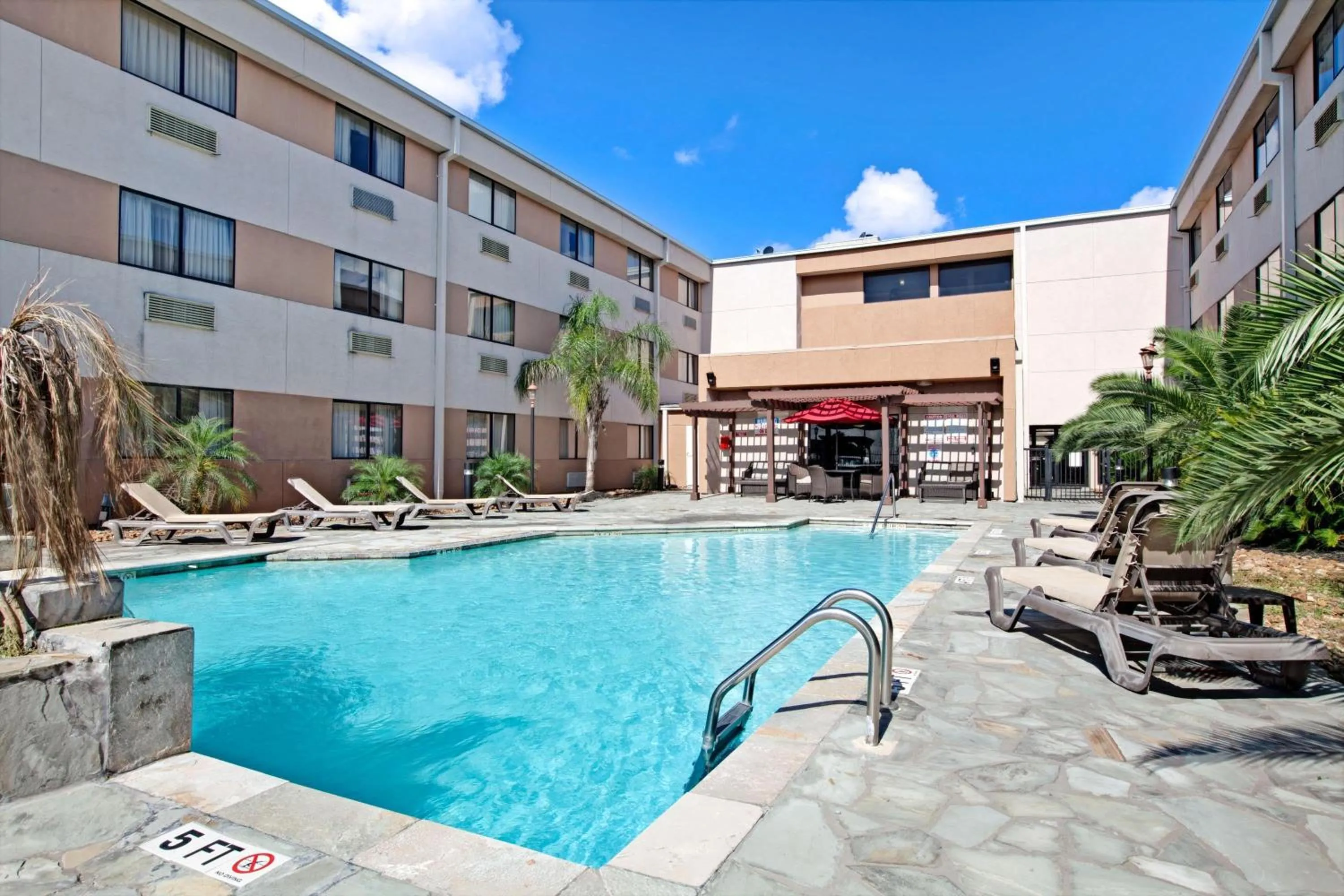 Pool view in Ramada by Wyndham Houston Intercontinental Airport South