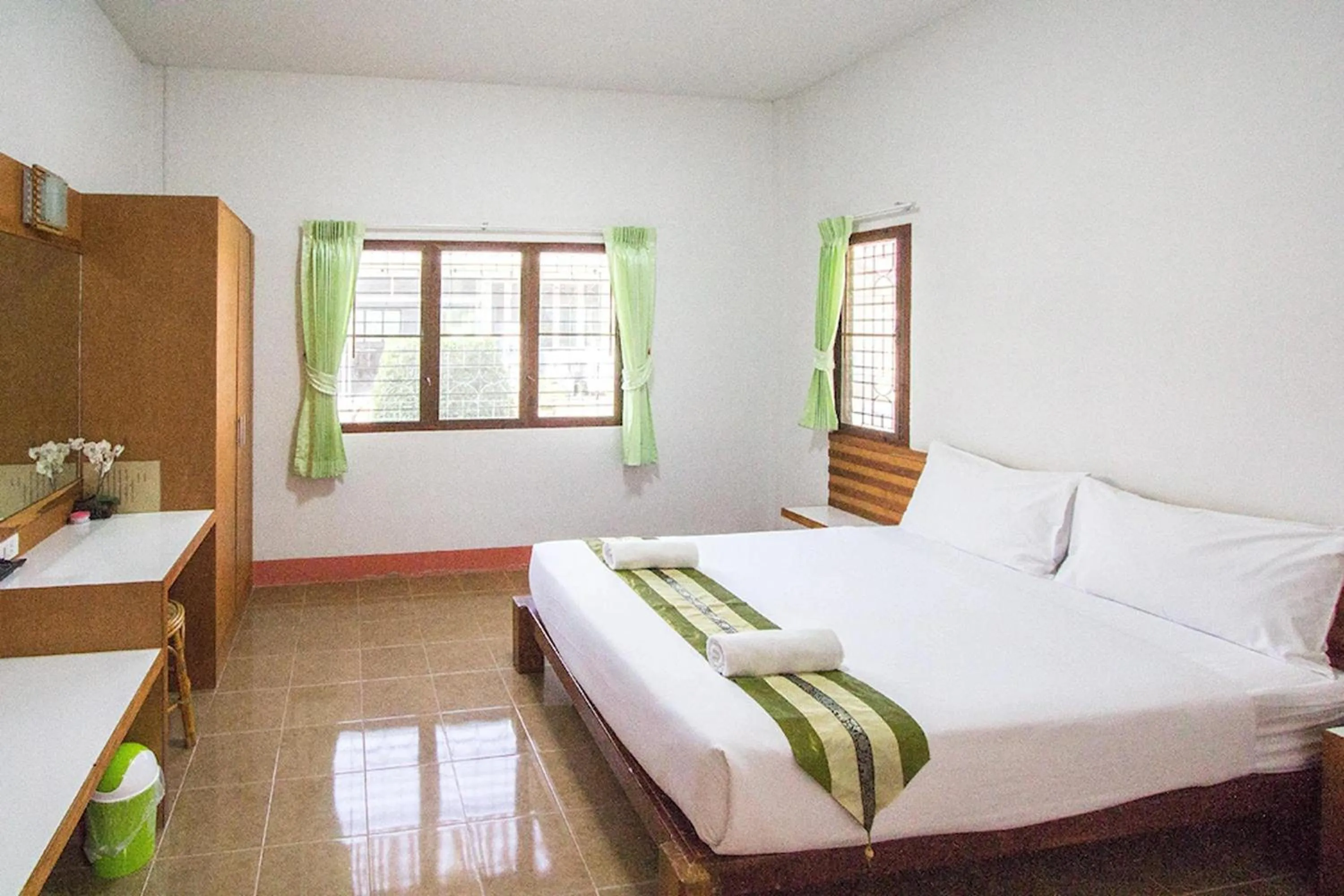 Bed in Ruentara Resort & Villa
