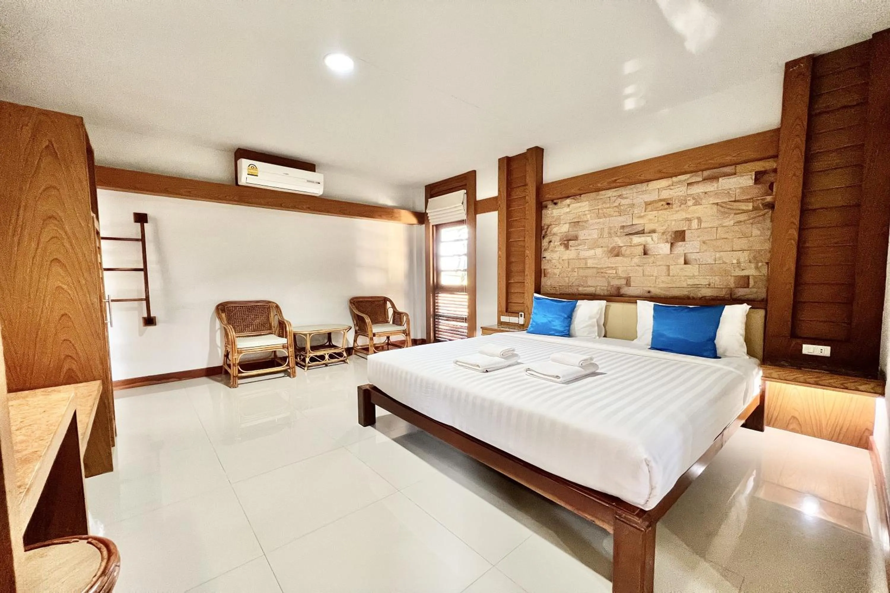 Bed in Ruentara Resort & Villa