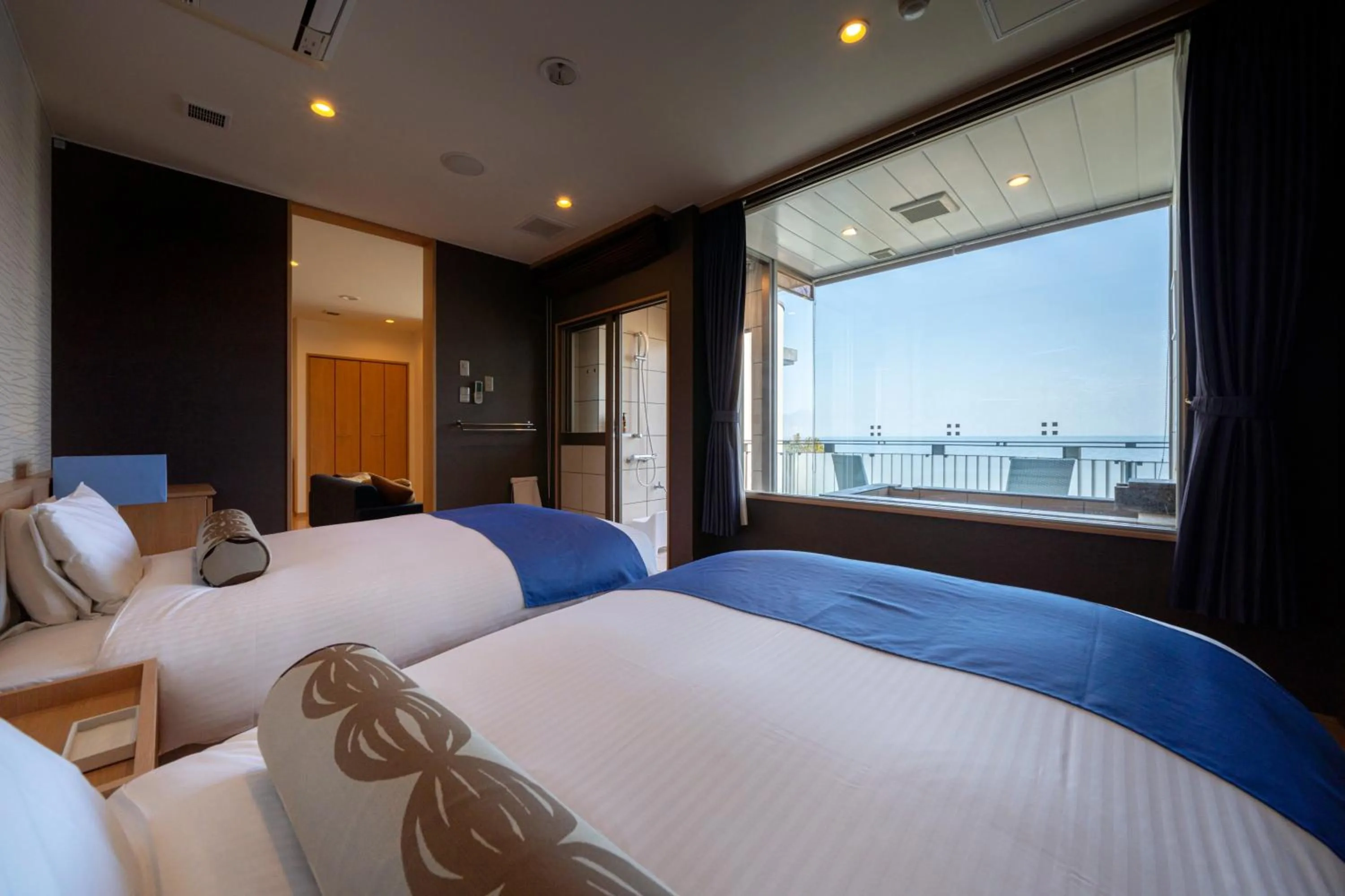 Bed in Auberge Fontaine Bleau Atami