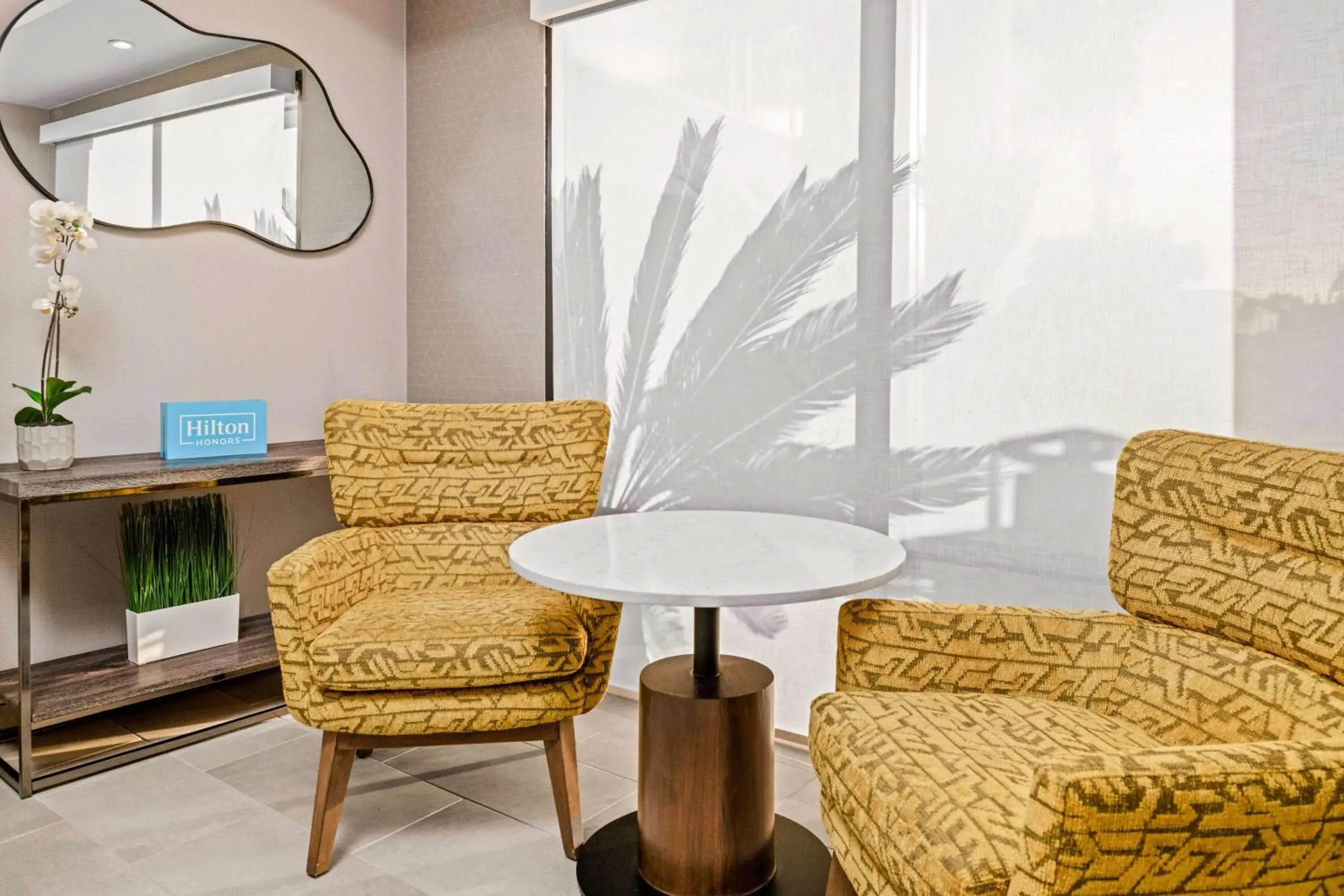 Lobby or reception in Hampton Inn by Hilton Costa Mesa Newport Beach Lobby or reception in Hampton Inn by Hilton Costa Mesa Newport Beach