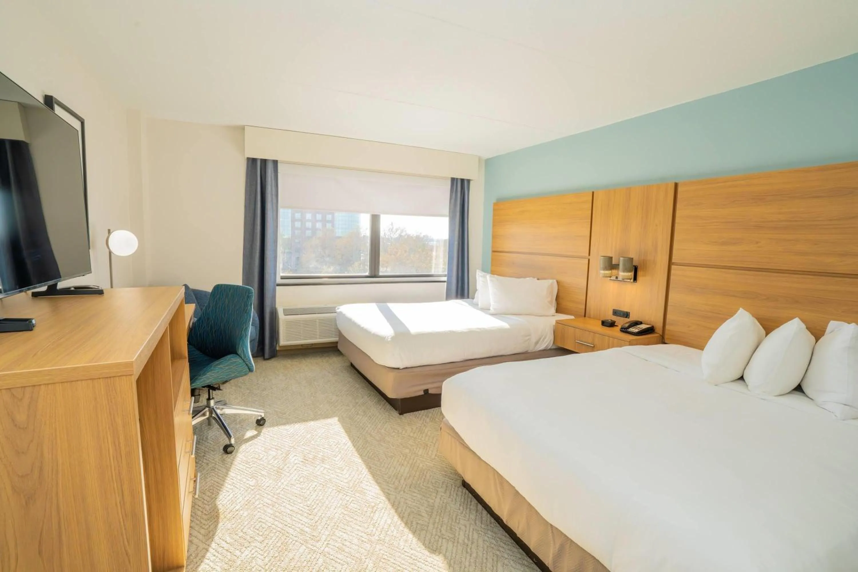 Photo of the whole room, Bed in Elimwood Hotel, a Ramada by Wyndham