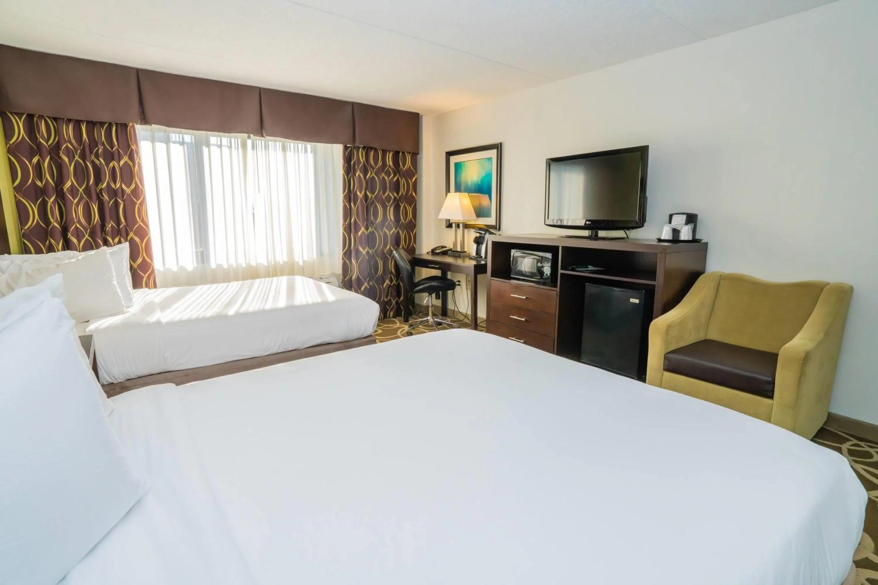 Photo of the whole room, Bed in Elimwood Hotel, a Ramada by Wyndham