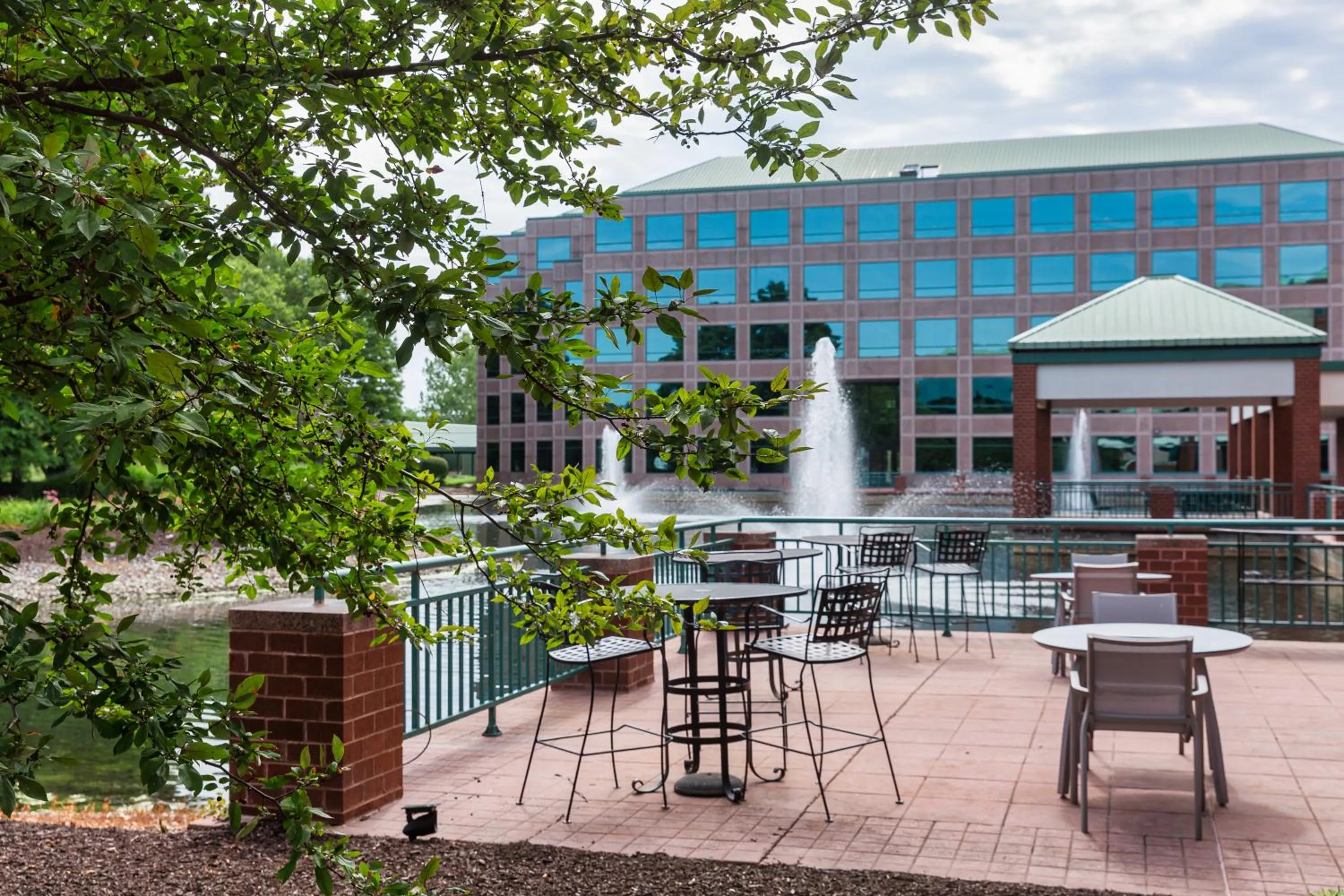 Patio in Elimwood Hotel, a Ramada by Wyndham