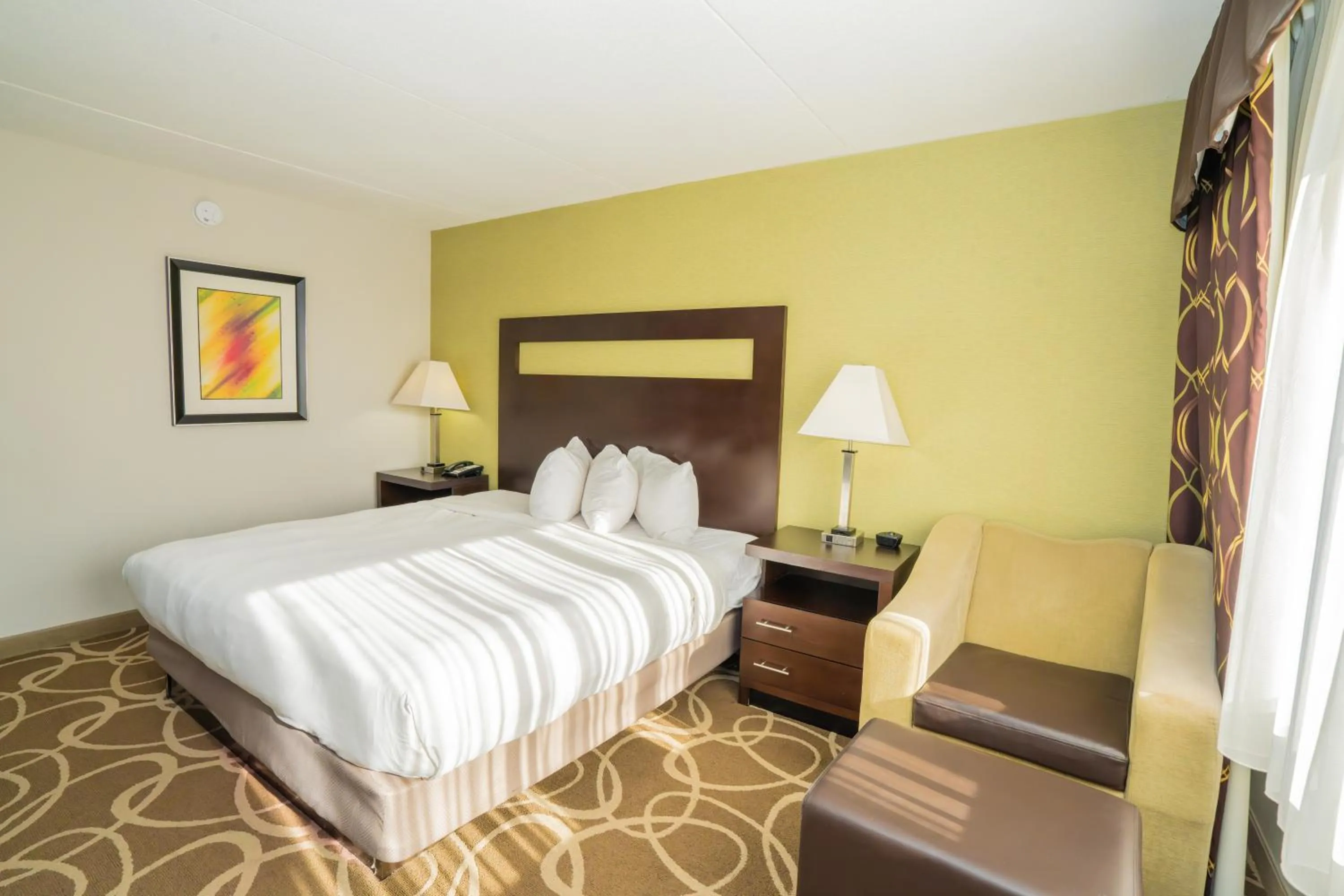 Guests, Bed in Elimwood Hotel, a Ramada by Wyndham