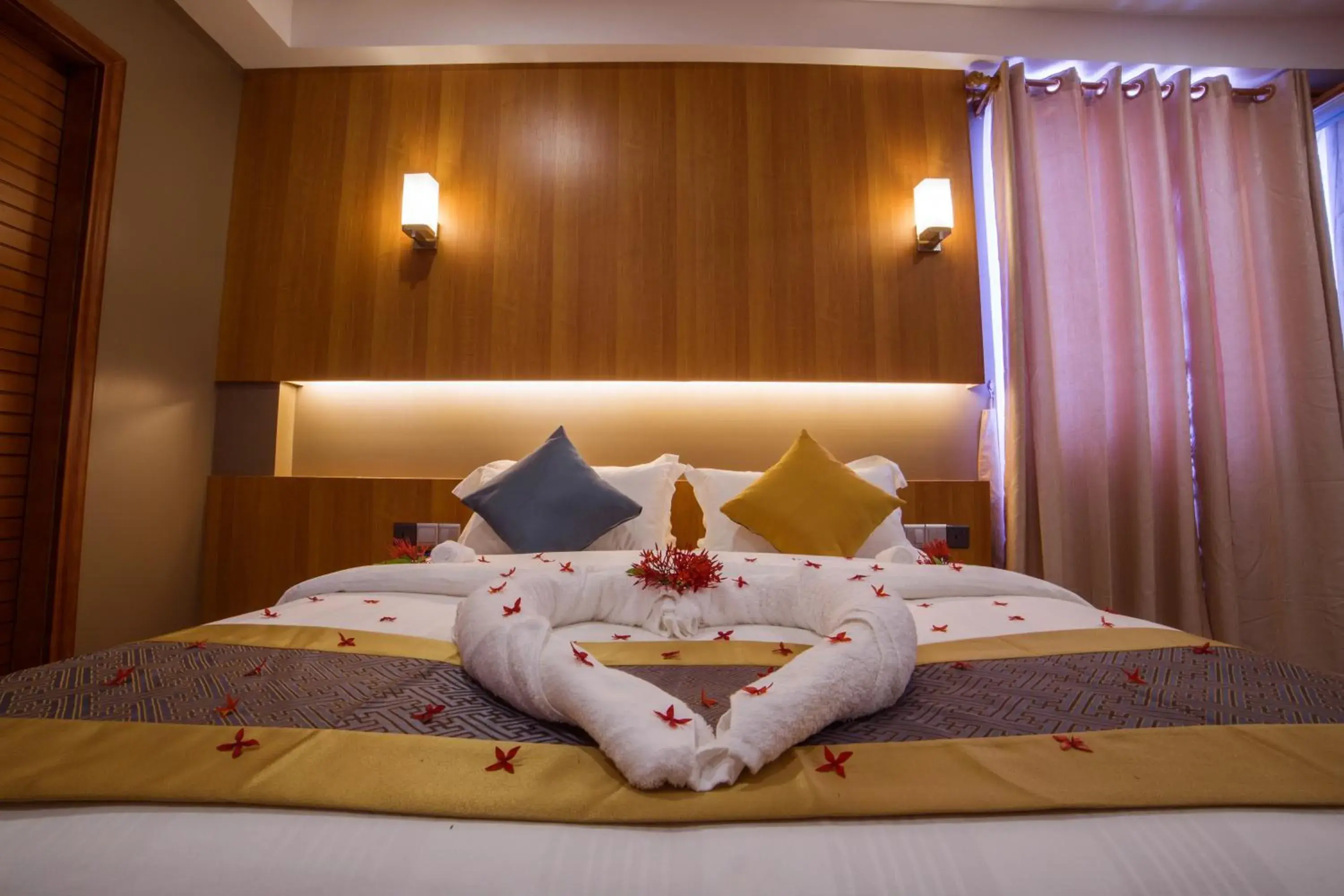 Bed in Kuredhi Beach Inn Bed in Kuredhi Beach Inn