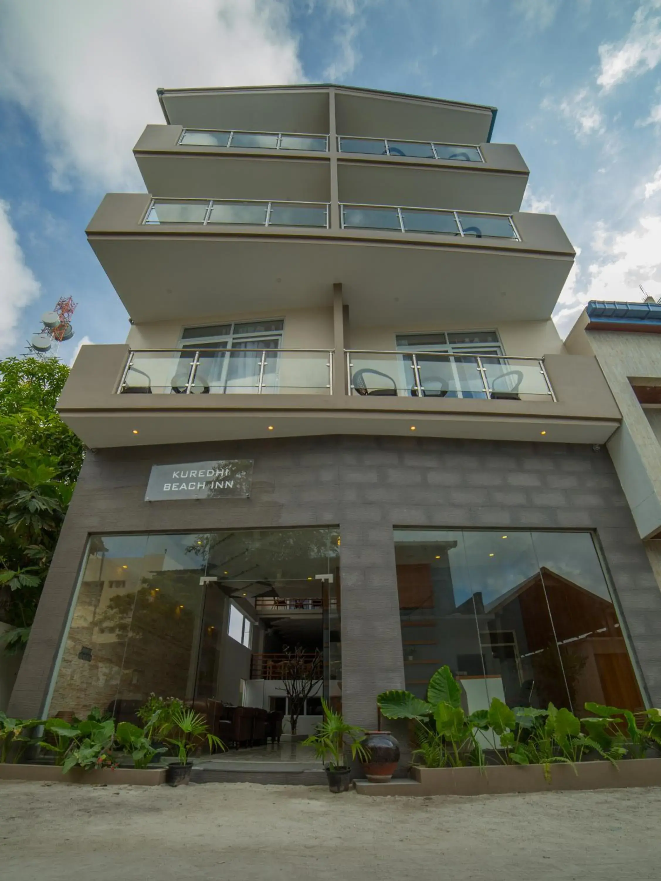 Property building in Kuredhi Beach Inn Property building in Kuredhi Beach Inn