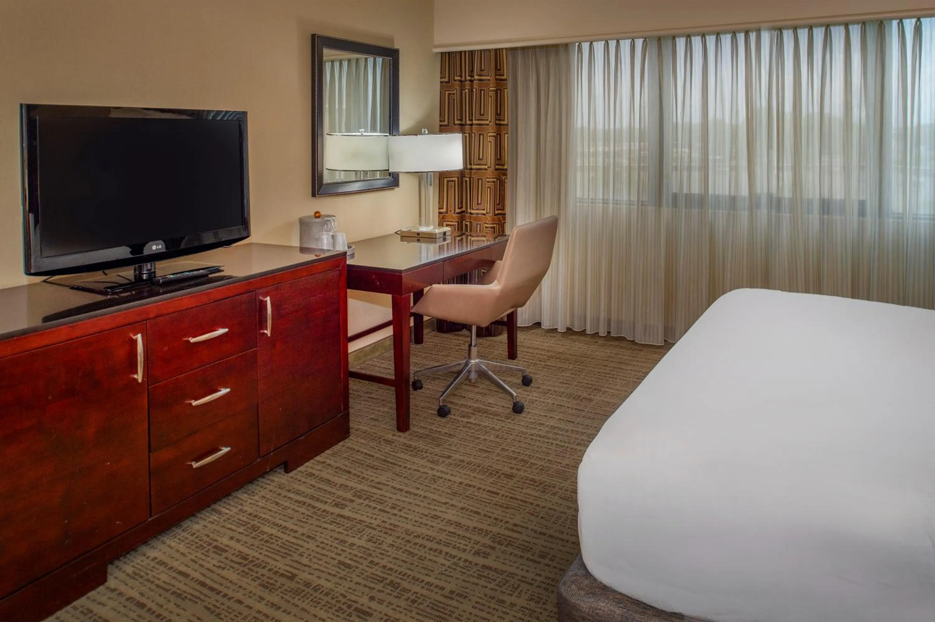 Bed in Crowne Plaza Hotel St. Louis Airport by IHG
