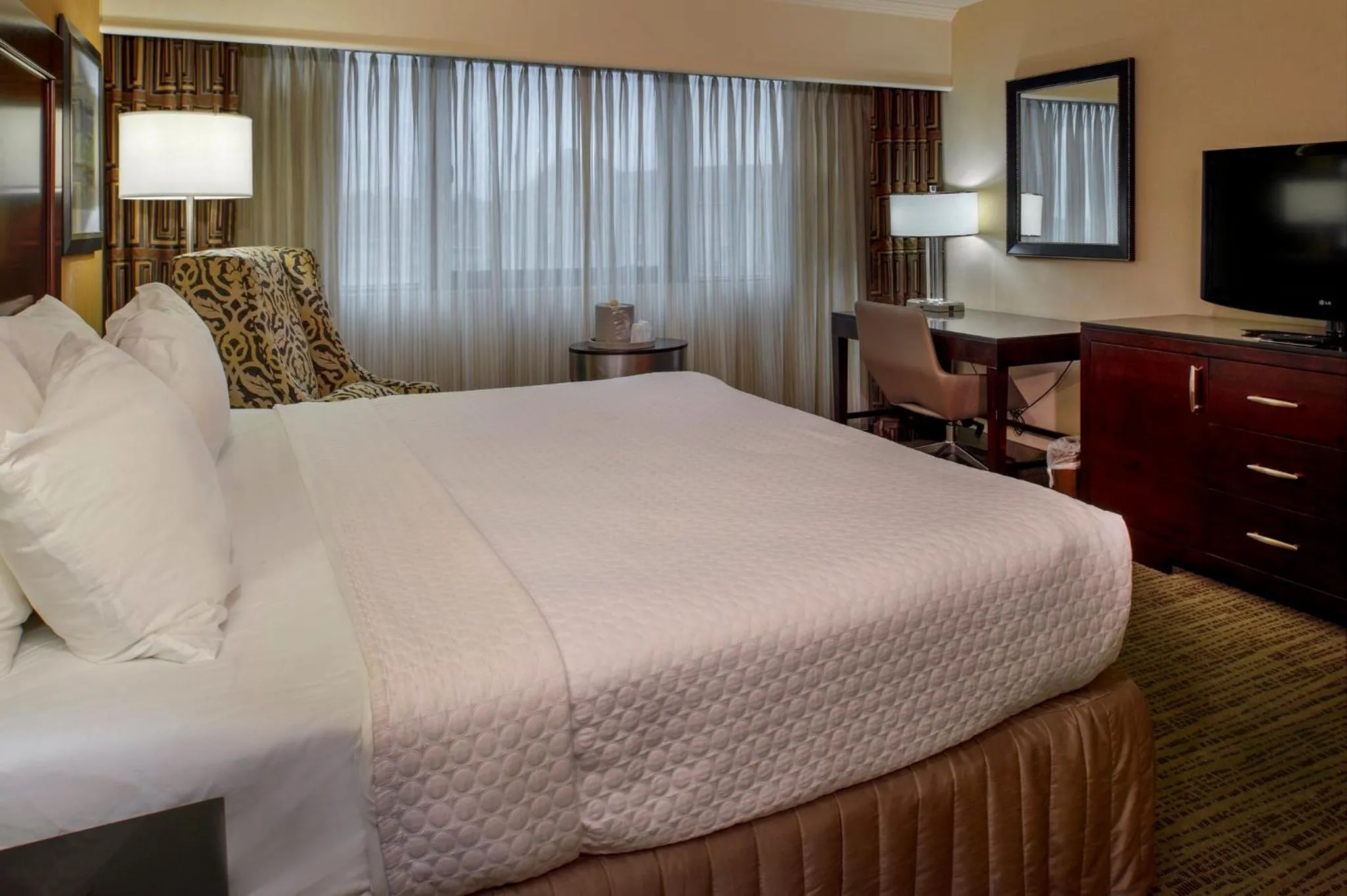 Photo of the whole room, Bed in Crowne Plaza Hotel St. Louis Airport by IHG