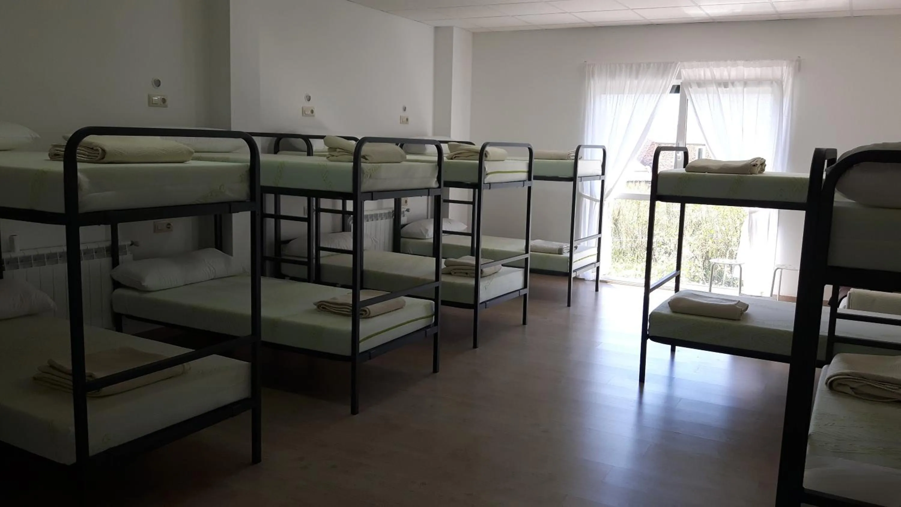 Bed in Albergue O Trisquel