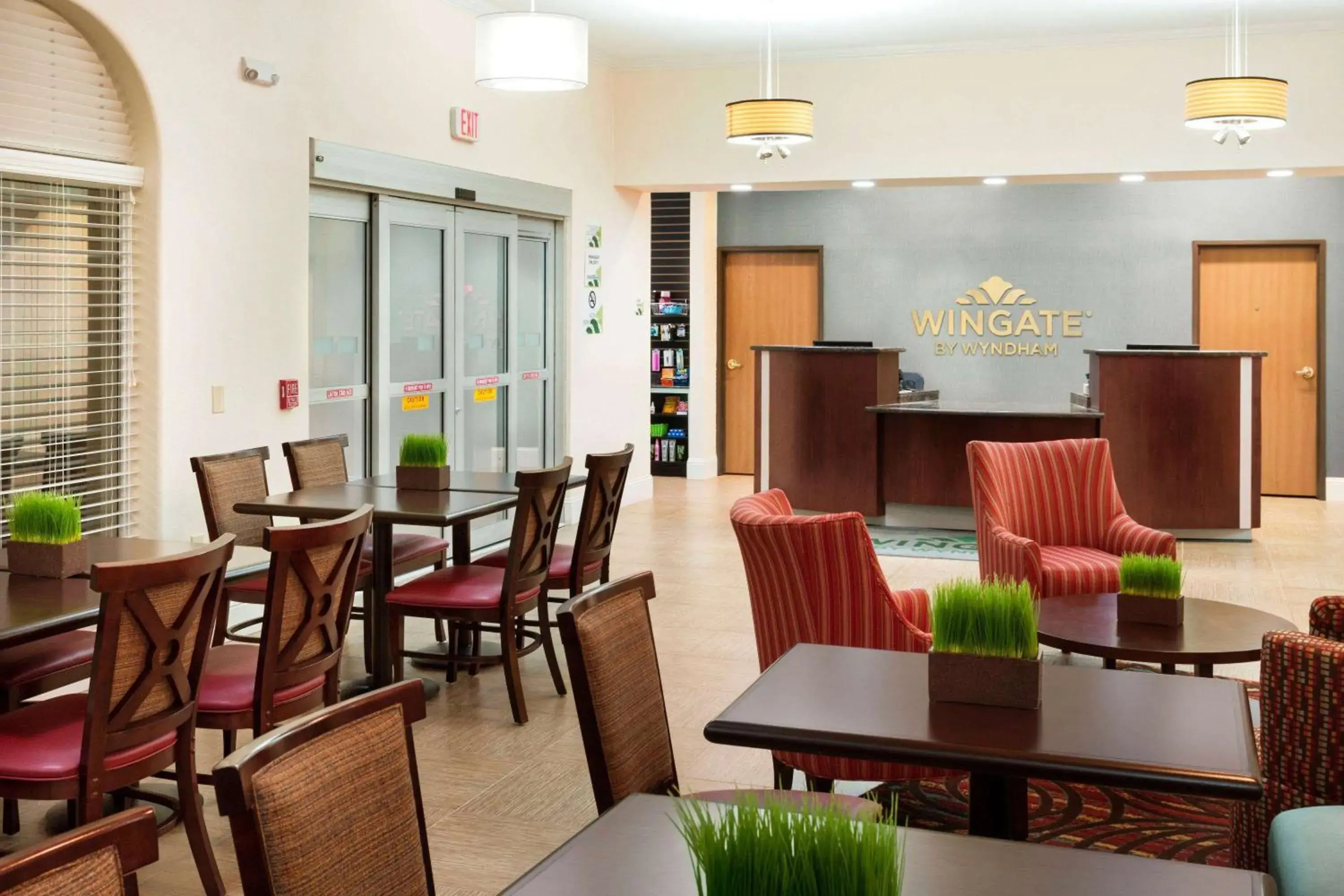 Lobby or reception in Wingate by Wyndham San Marcos Lobby or reception in Wingate by Wyndham San Marcos