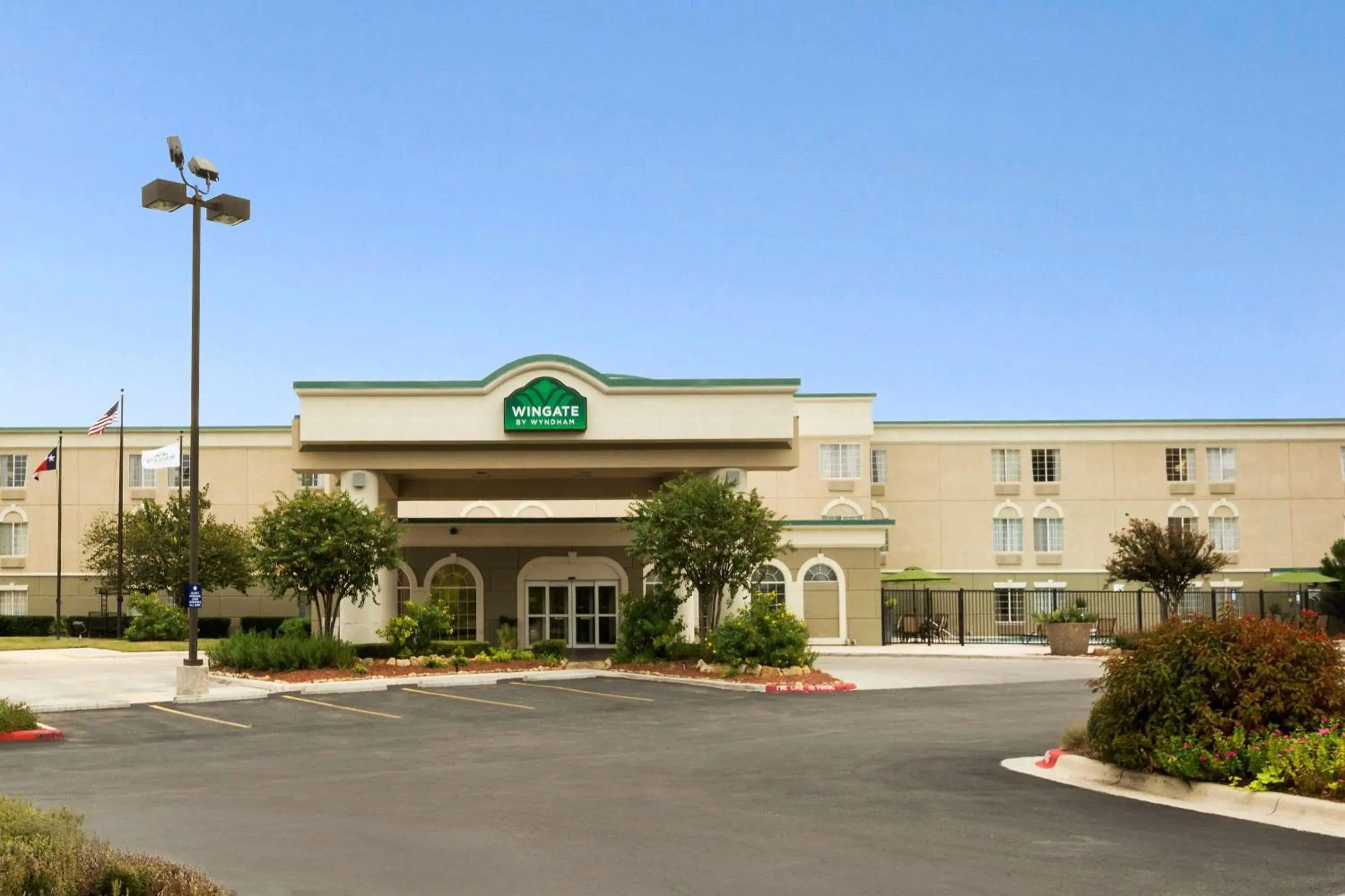 Property building in Wingate by Wyndham San Marcos Property building in Wingate by Wyndham San Marcos