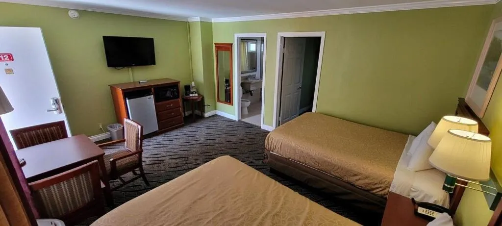 Bed in Redondo Inn and Suites