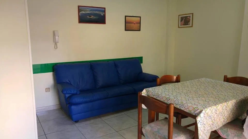 Communal lounge/ TV room in Casa Viale Lido