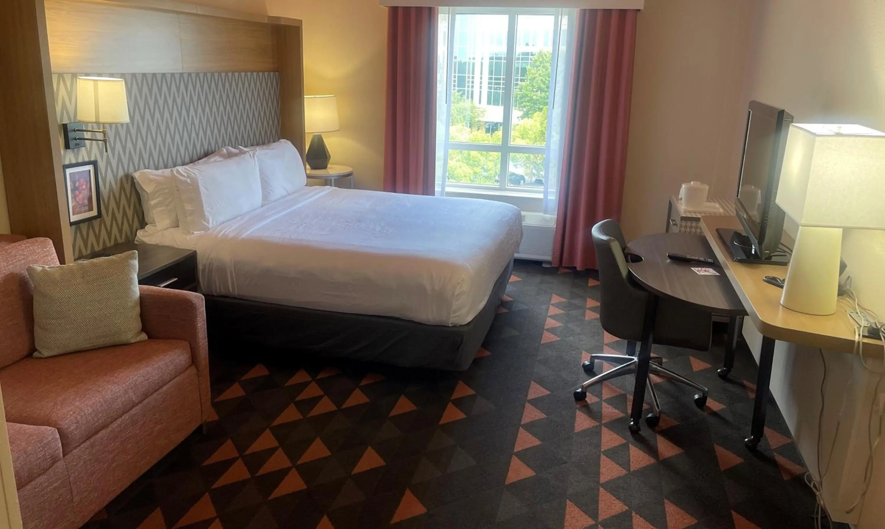 Photo of the whole room, Bed in Holiday Inn Atlanta-Gas South Arena Area by IHG