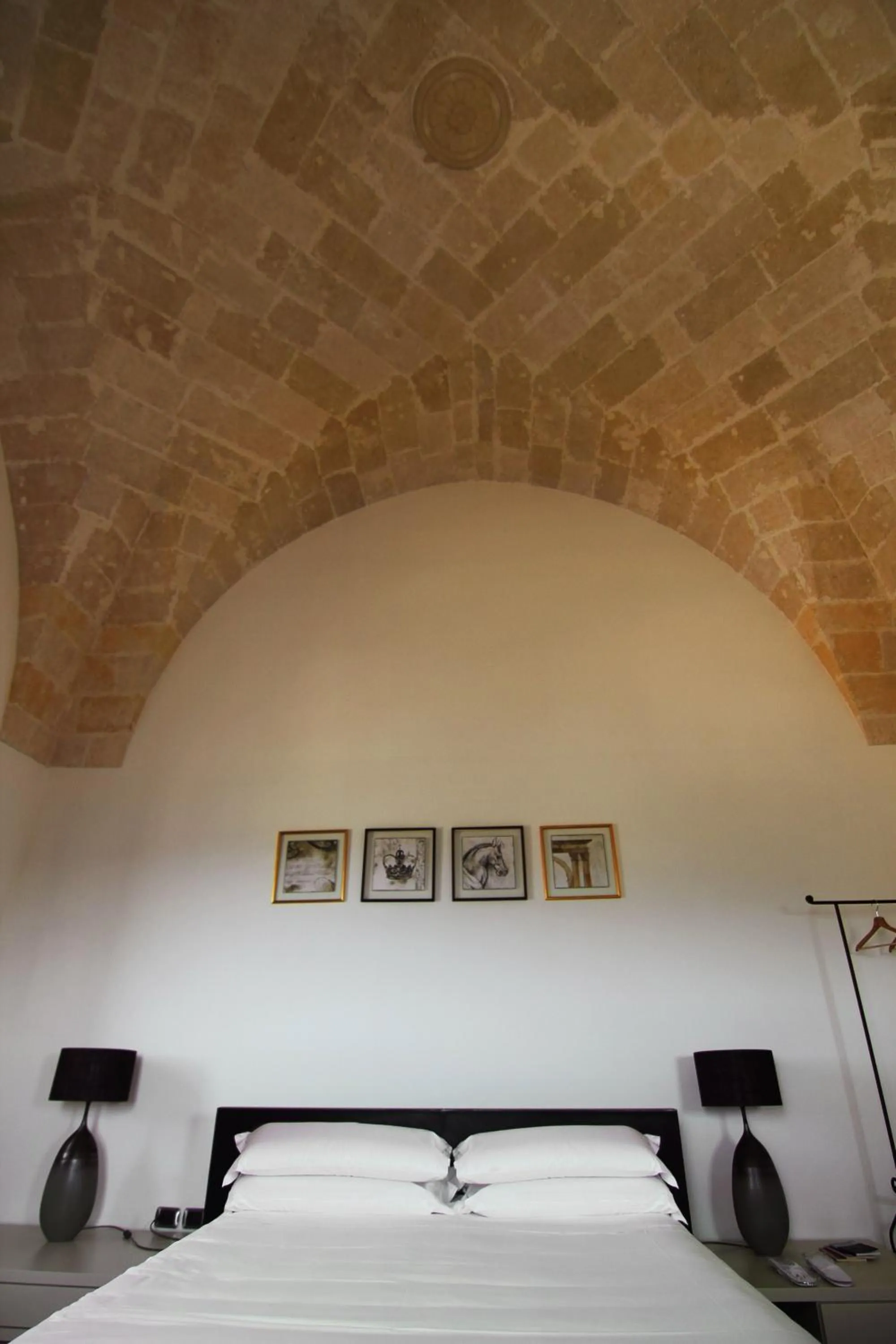 Decorative detail, Bed in Antica Civita Luxury Room