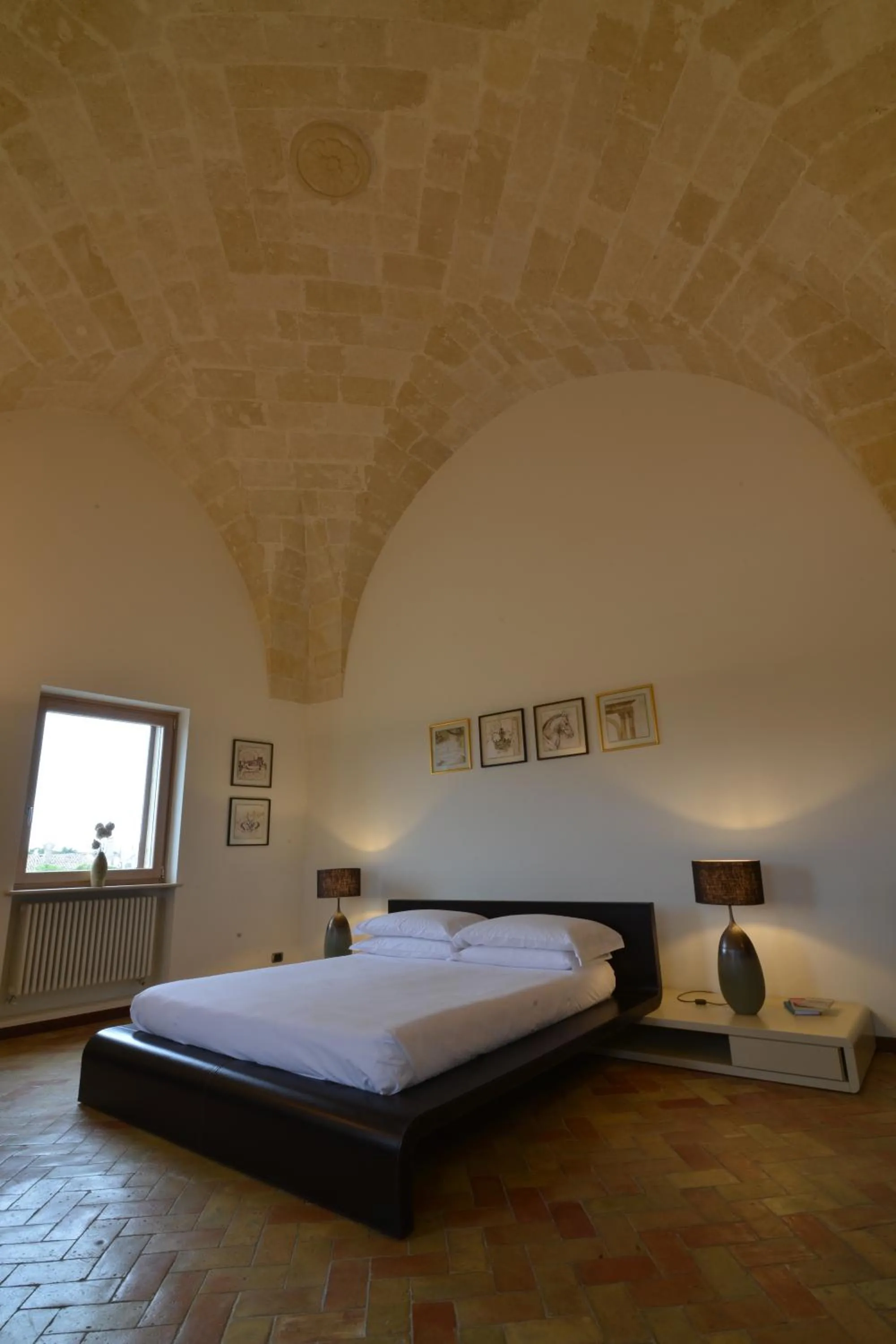 Photo of the whole room, Bed in Antica Civita Luxury Room