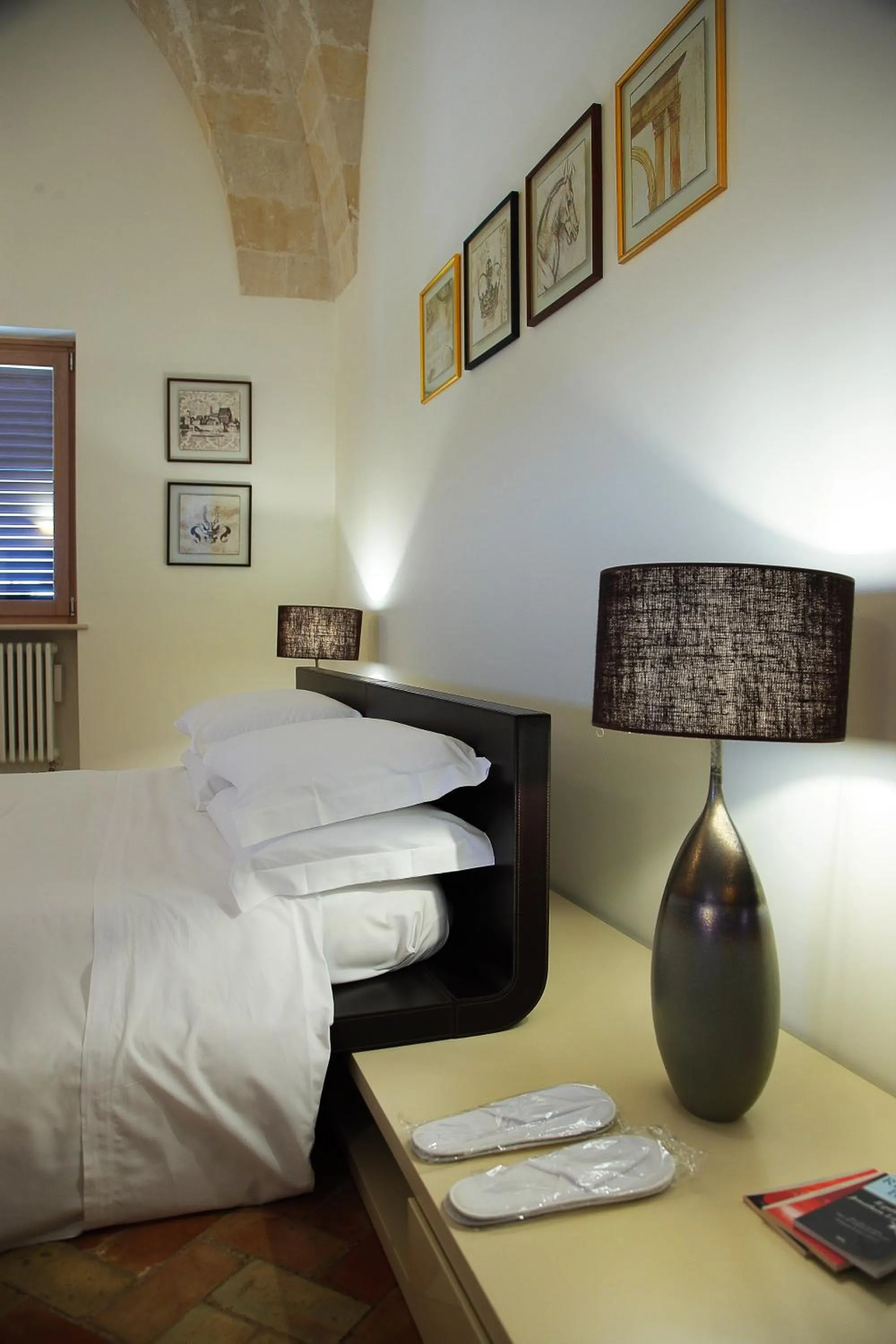 Bed in Antica Civita Luxury Room