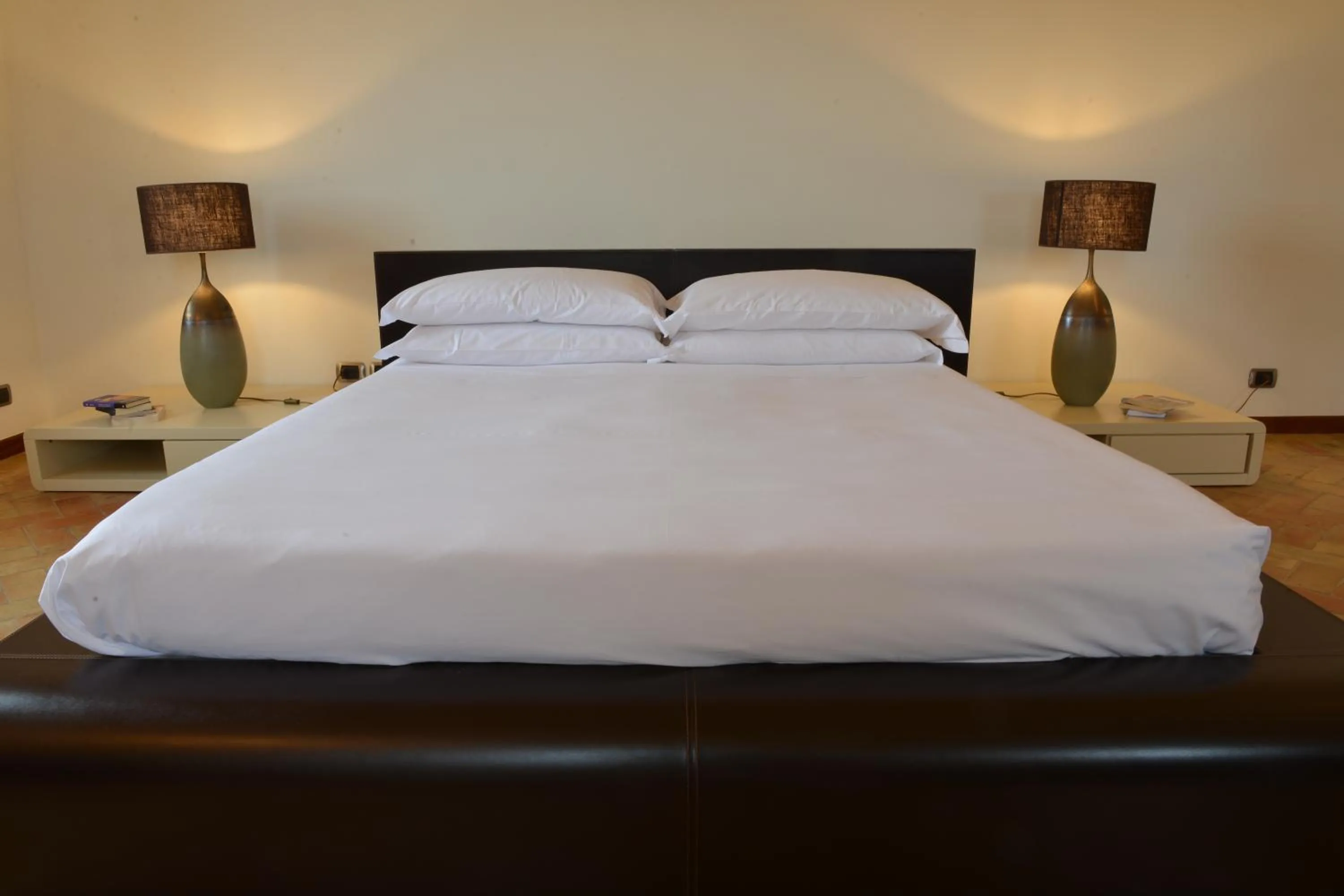 Bed in Antica Civita Luxury Room