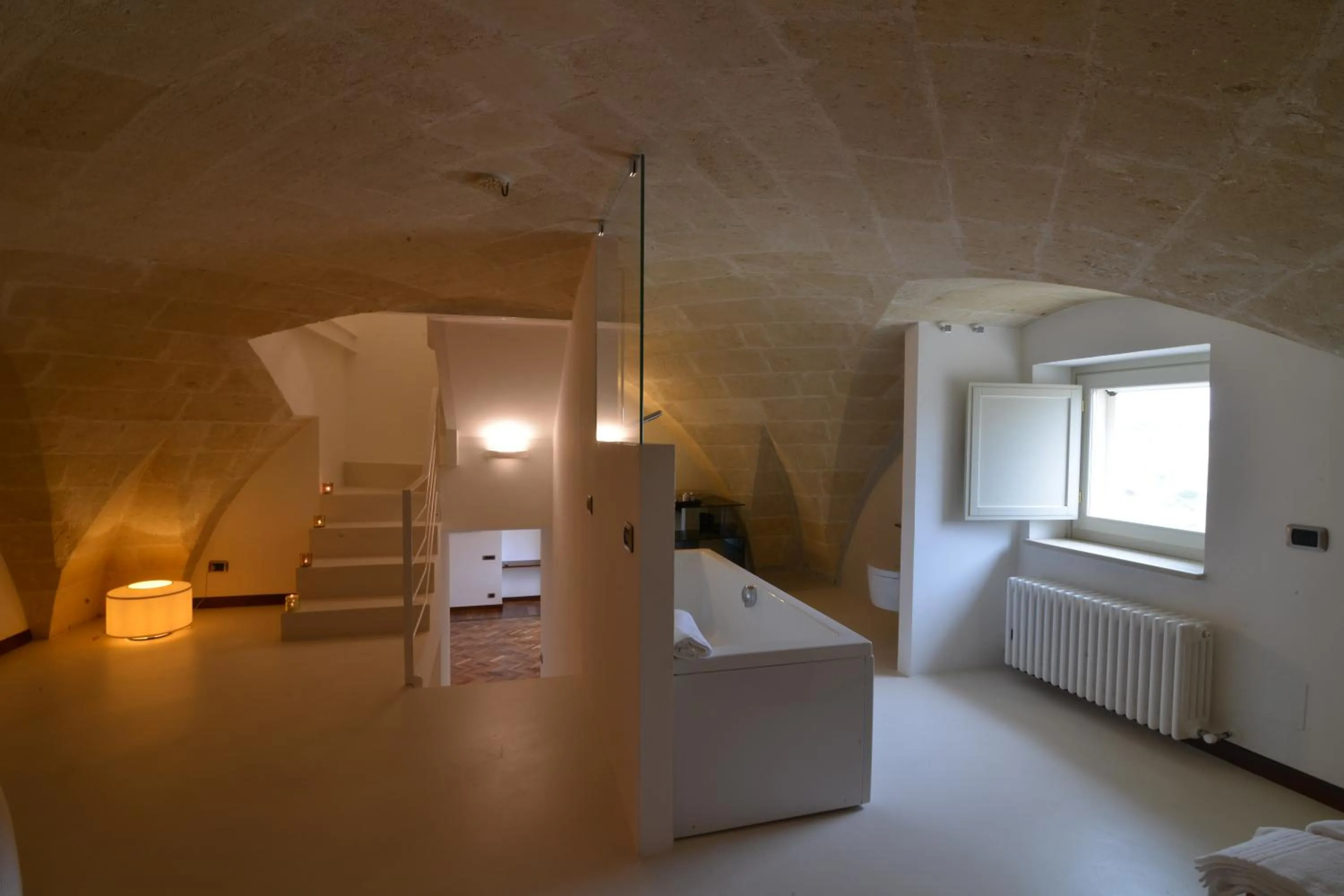 Photo of the whole room, Bed in Antica Civita Luxury Room
