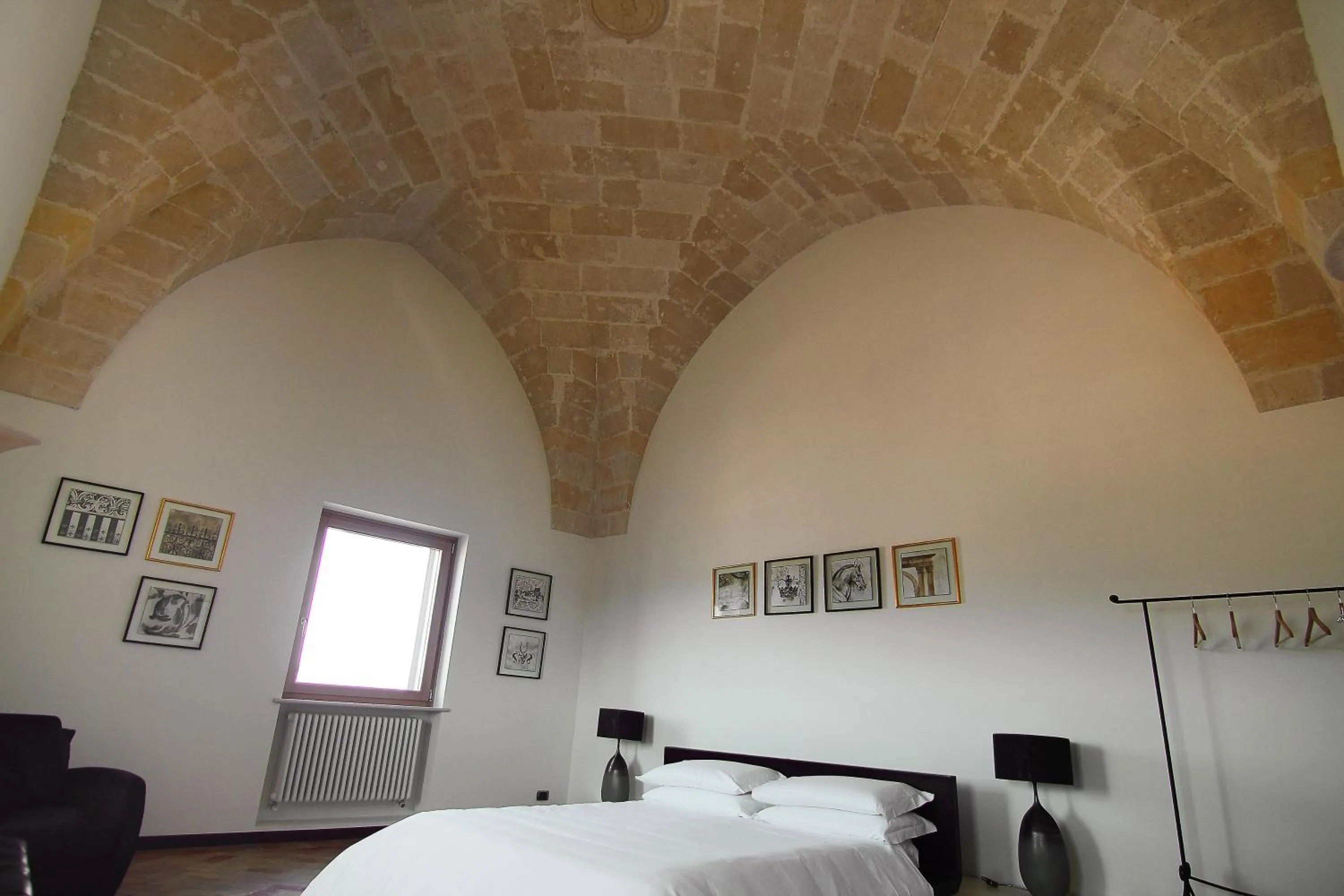 Photo of the whole room, Bed in Antica Civita Luxury Room