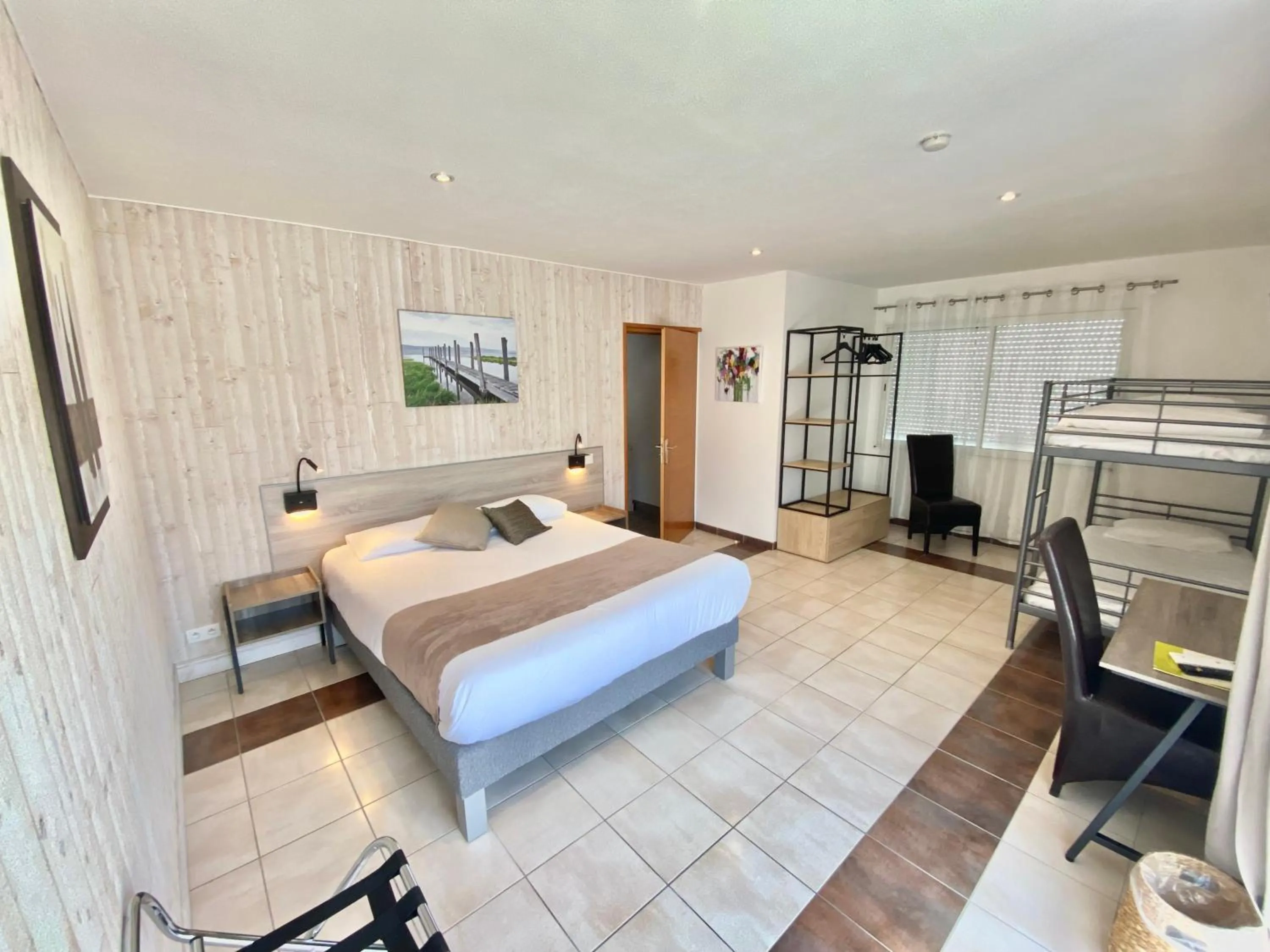 Bed in Logis Hôtel L'Oliveraie