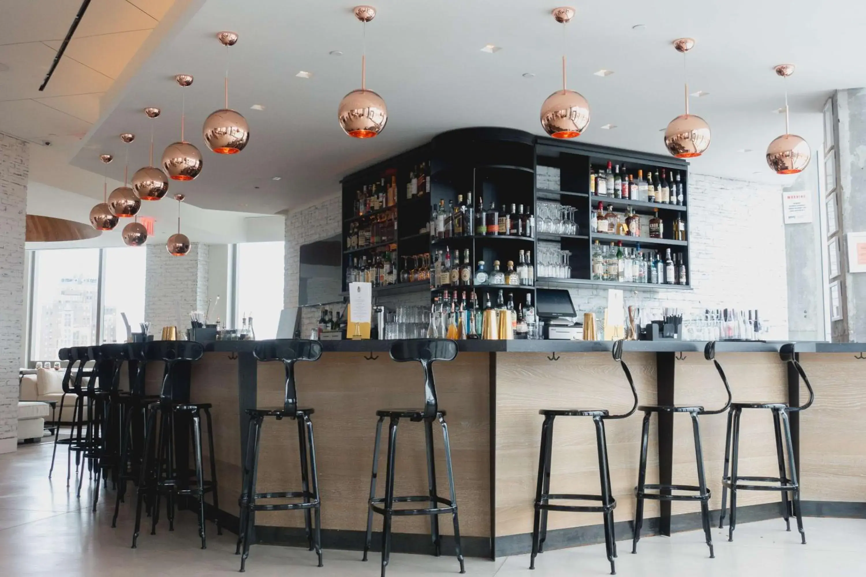 Lounge or bar in Hotel 50 Bowery, part of JdV by Hyatt Lounge or bar in Hotel 50 Bowery, part of JdV by Hyatt