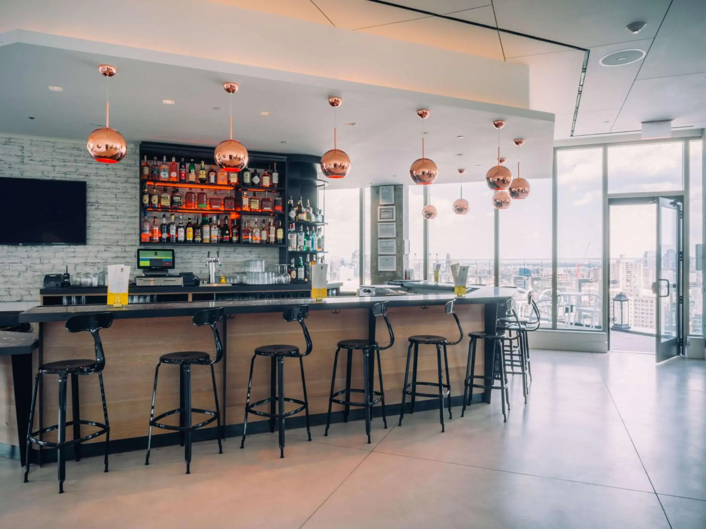 Lounge or bar in Hotel 50 Bowery, part of JdV by Hyatt Lounge or bar in Hotel 50 Bowery, part of JdV by Hyatt