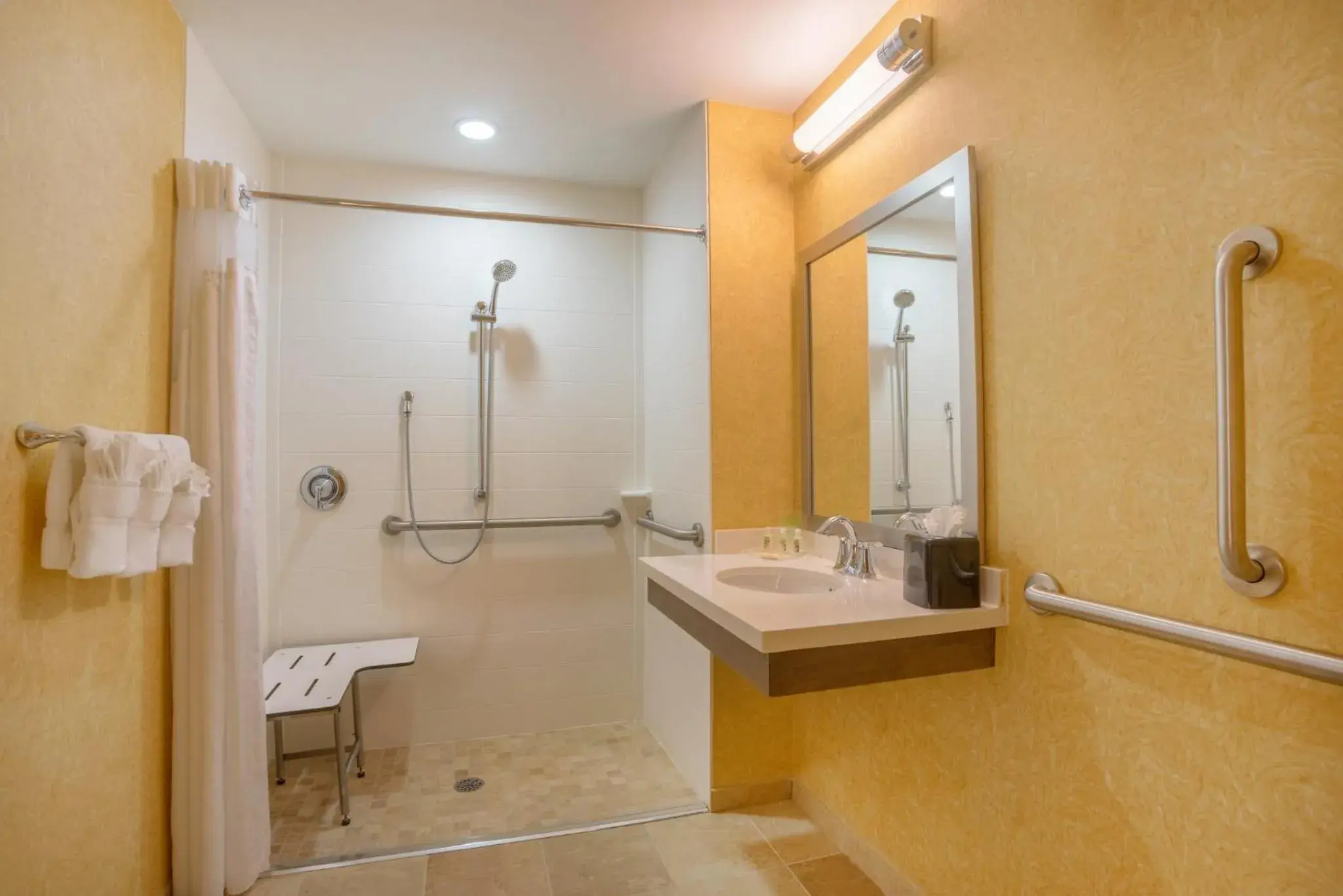 Bathroom in Holiday Inn Baltimore BWI Airport by IHG Bathroom in Holiday Inn Baltimore BWI Airport by IHG