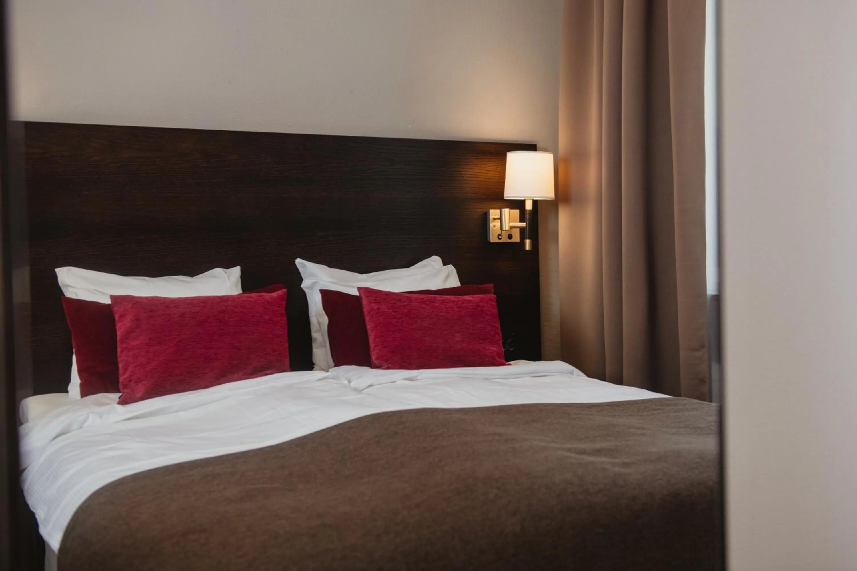 Bed in Home Hotel Drott