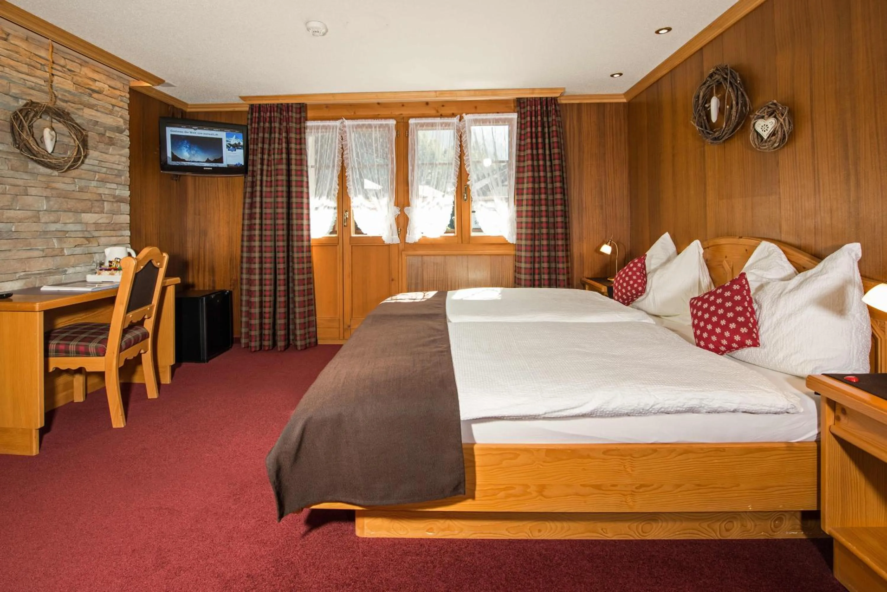 Photo of the whole room in Hotel Dufour Alpin Superior - Adults only