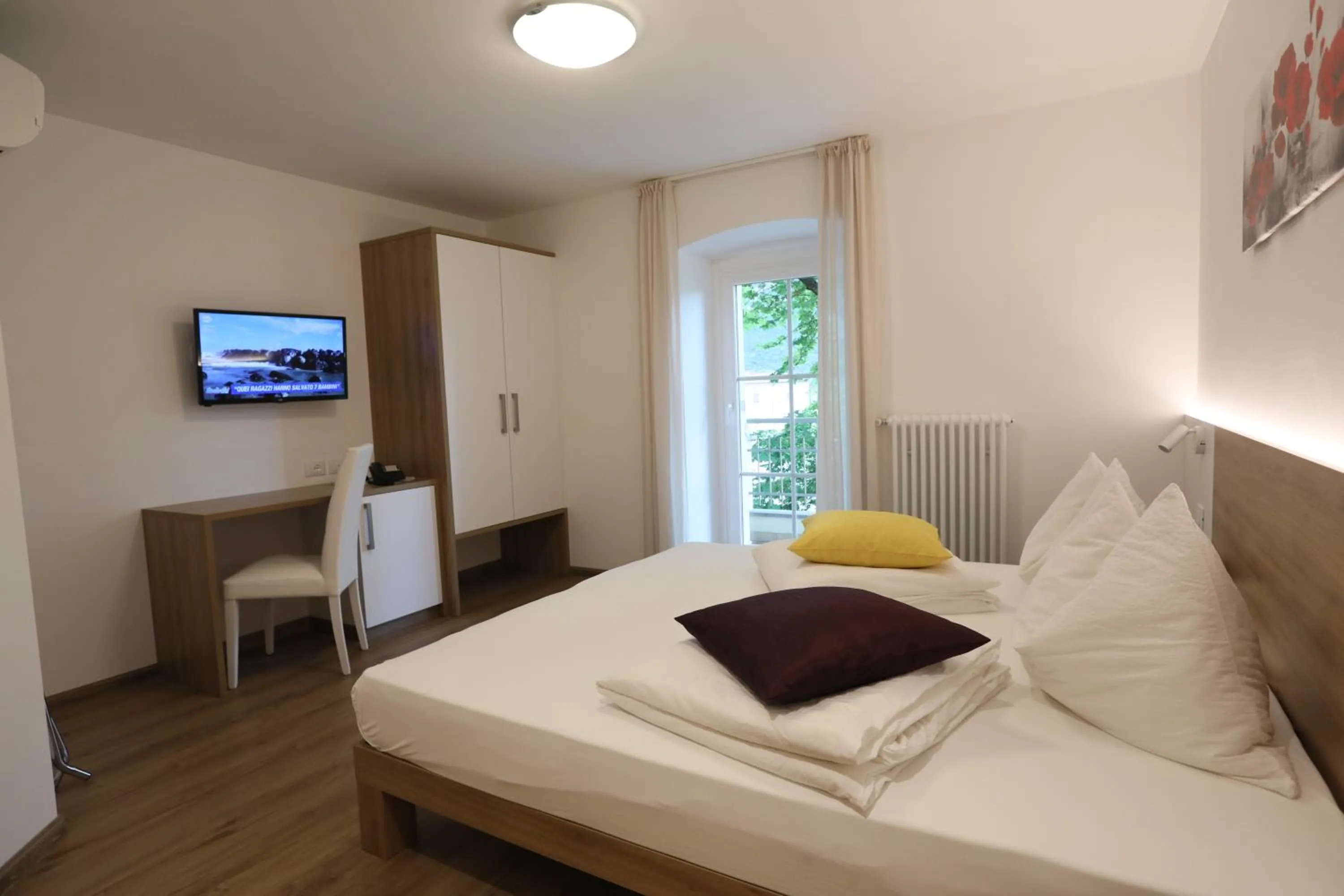 Bed in Hotel Stampfer B&B