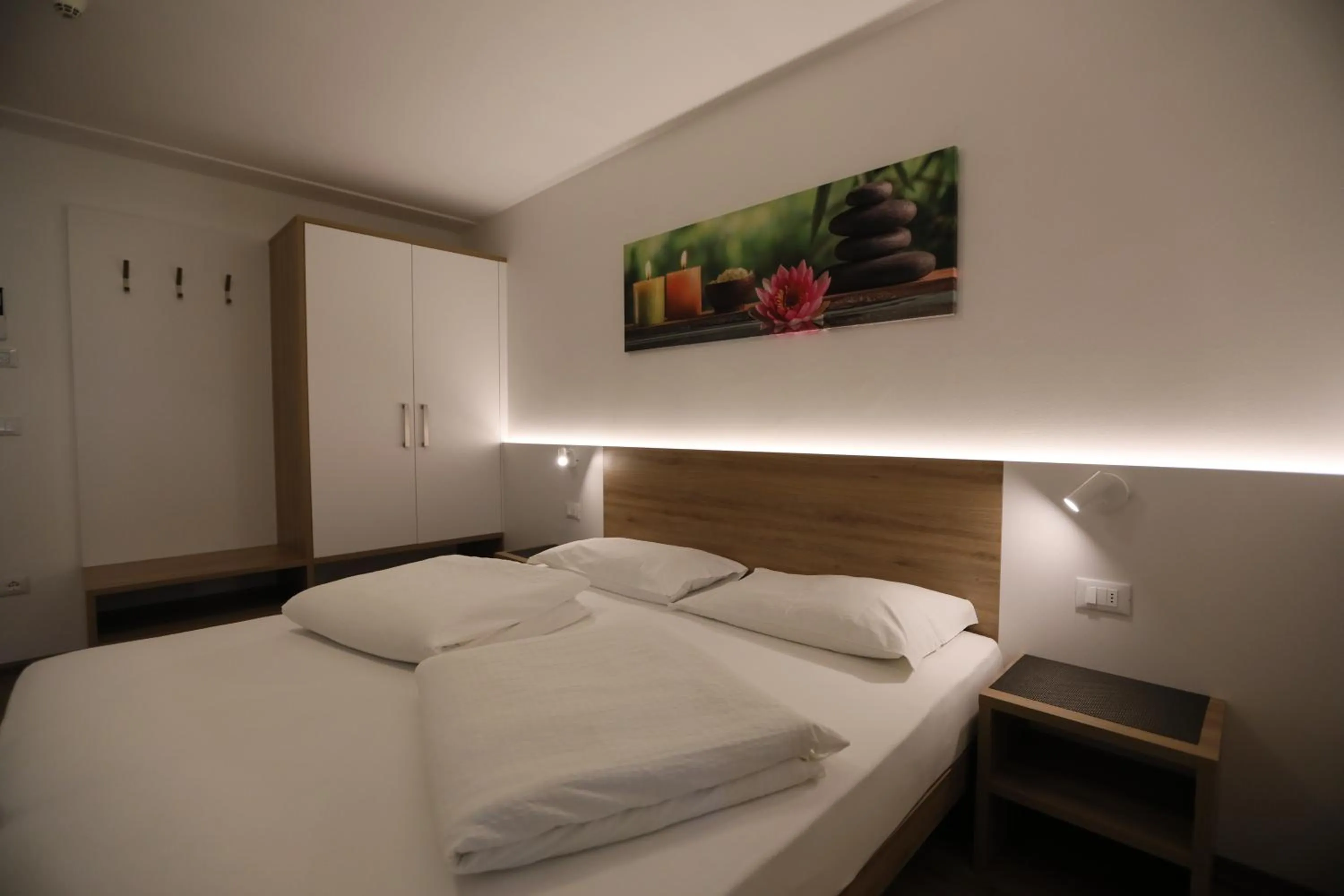 Bed in Hotel Stampfer B&B