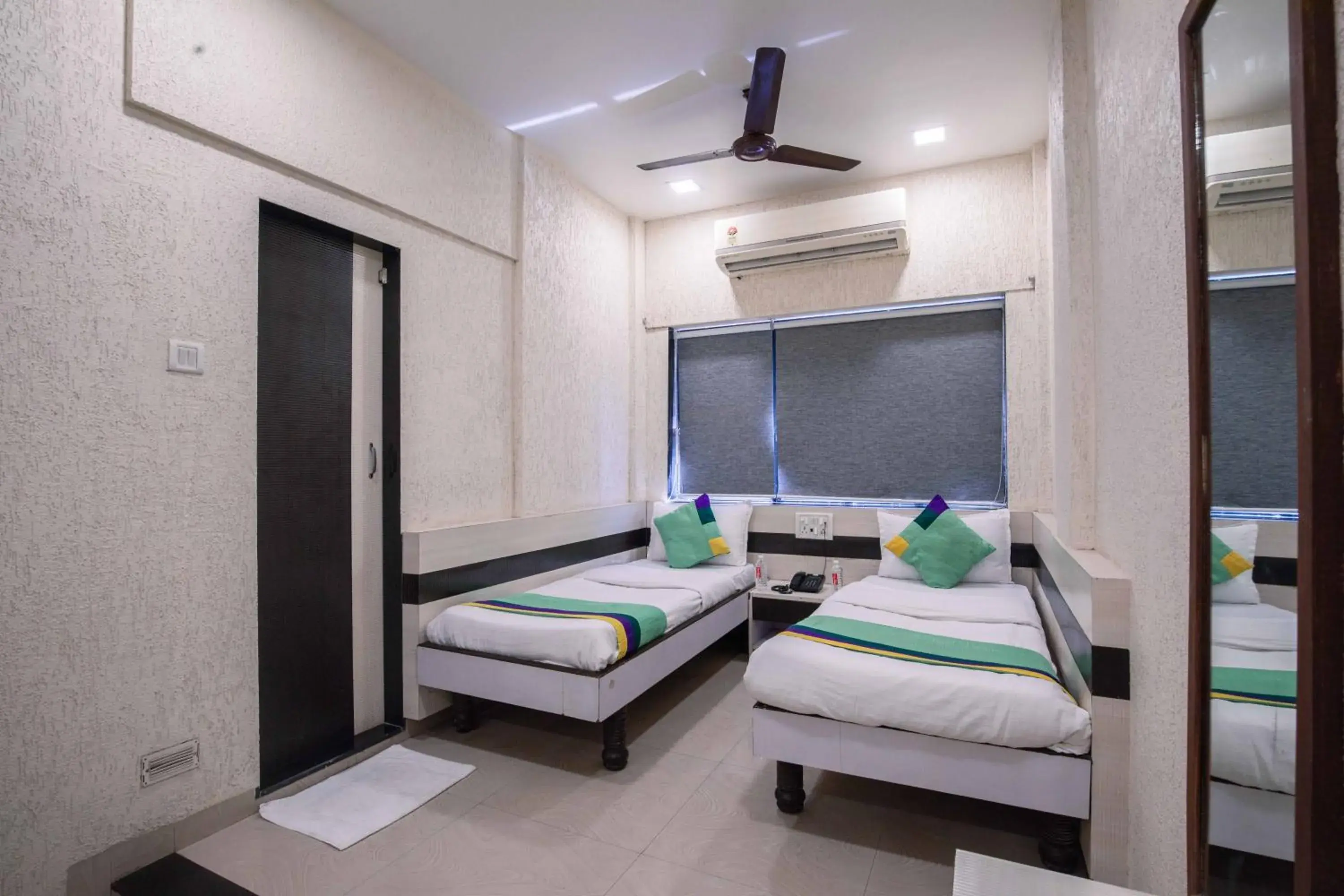 Bedroom, Bed in Treebo Hiramani Parel Lalbaug Bedroom, Bed in Treebo Hiramani Parel Lalbaug