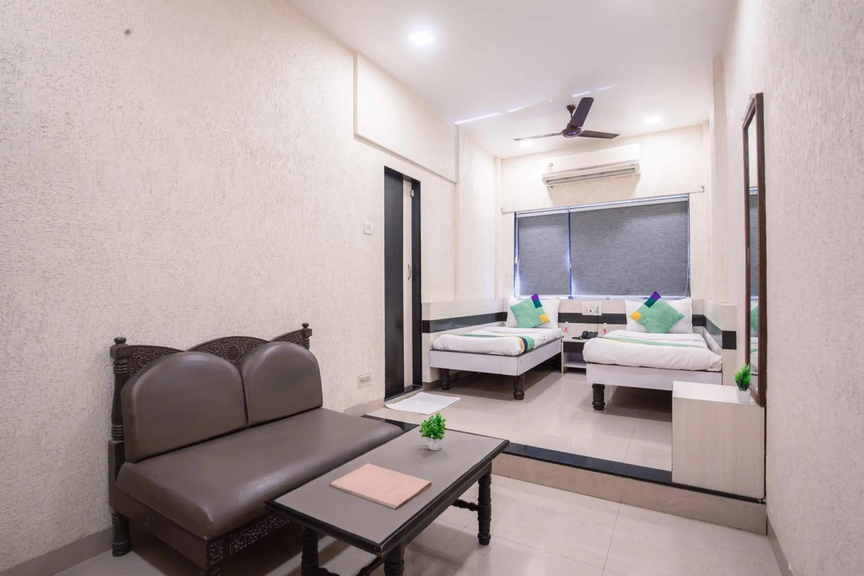 Seating area, Bed in Treebo Hiramani Parel Lalbaug Seating area, Bed in Treebo Hiramani Parel Lalbaug